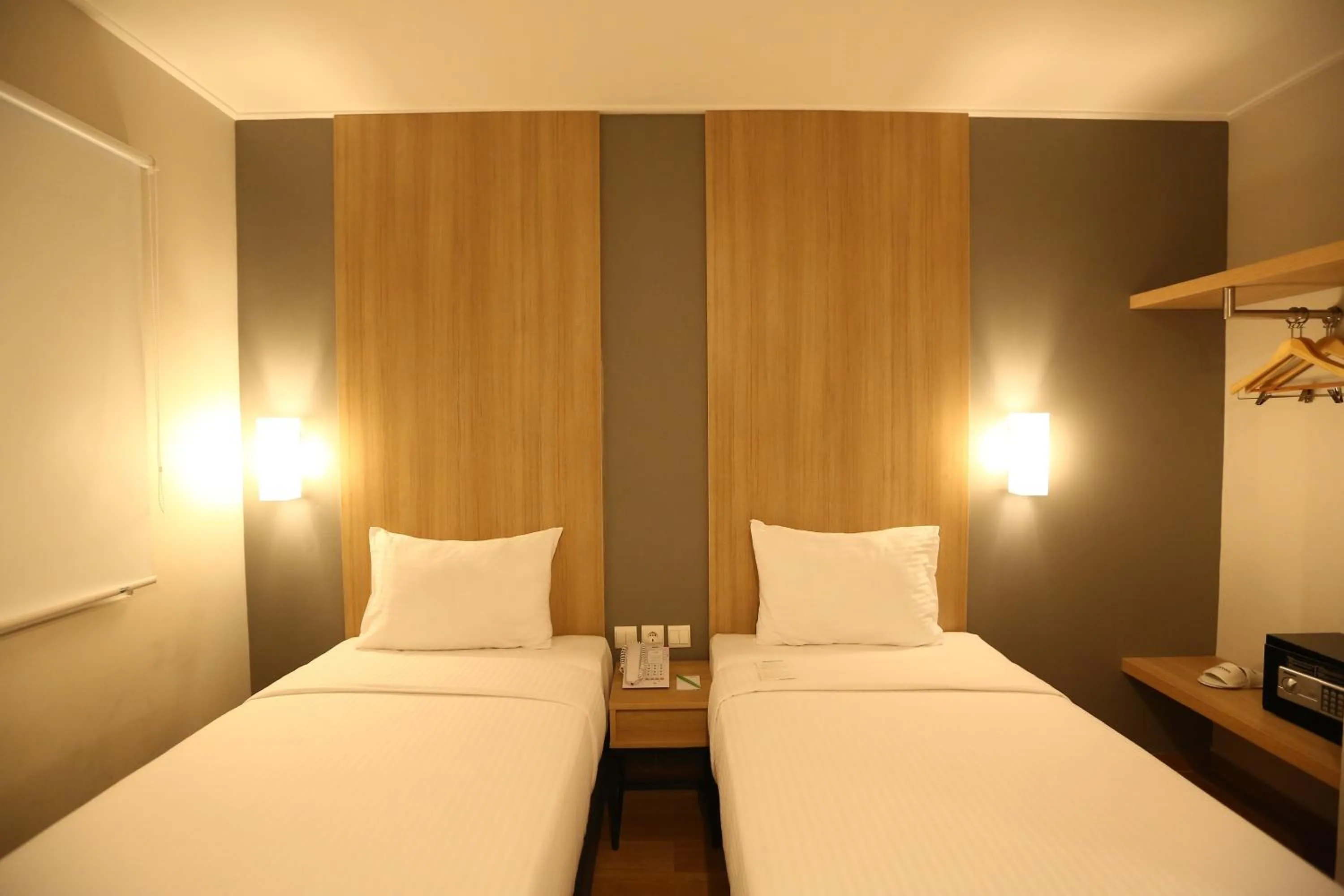 Photo of the whole room, Bed in Hotel Citradream Bandung