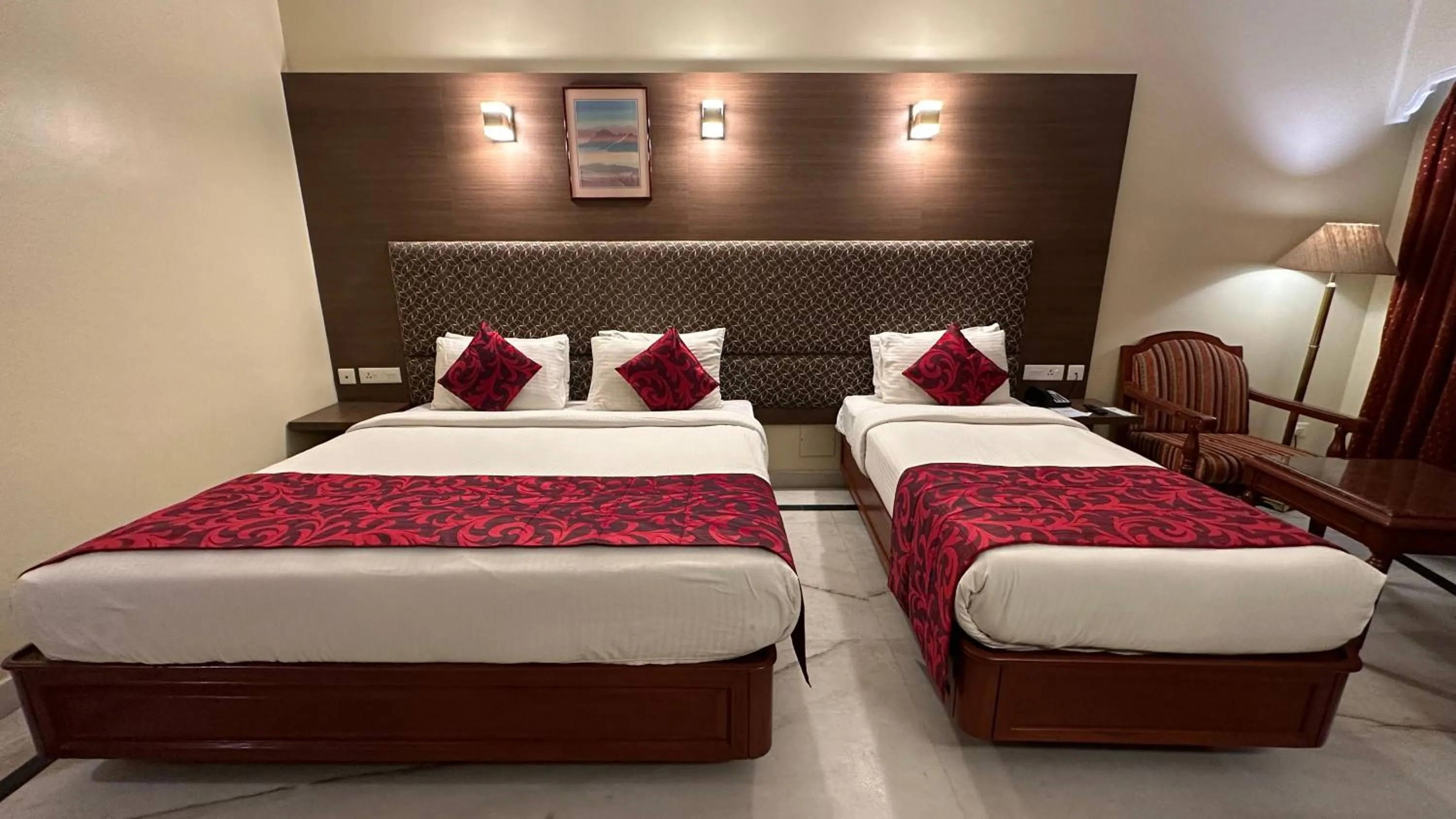 Bed in Hotel Annamalai International