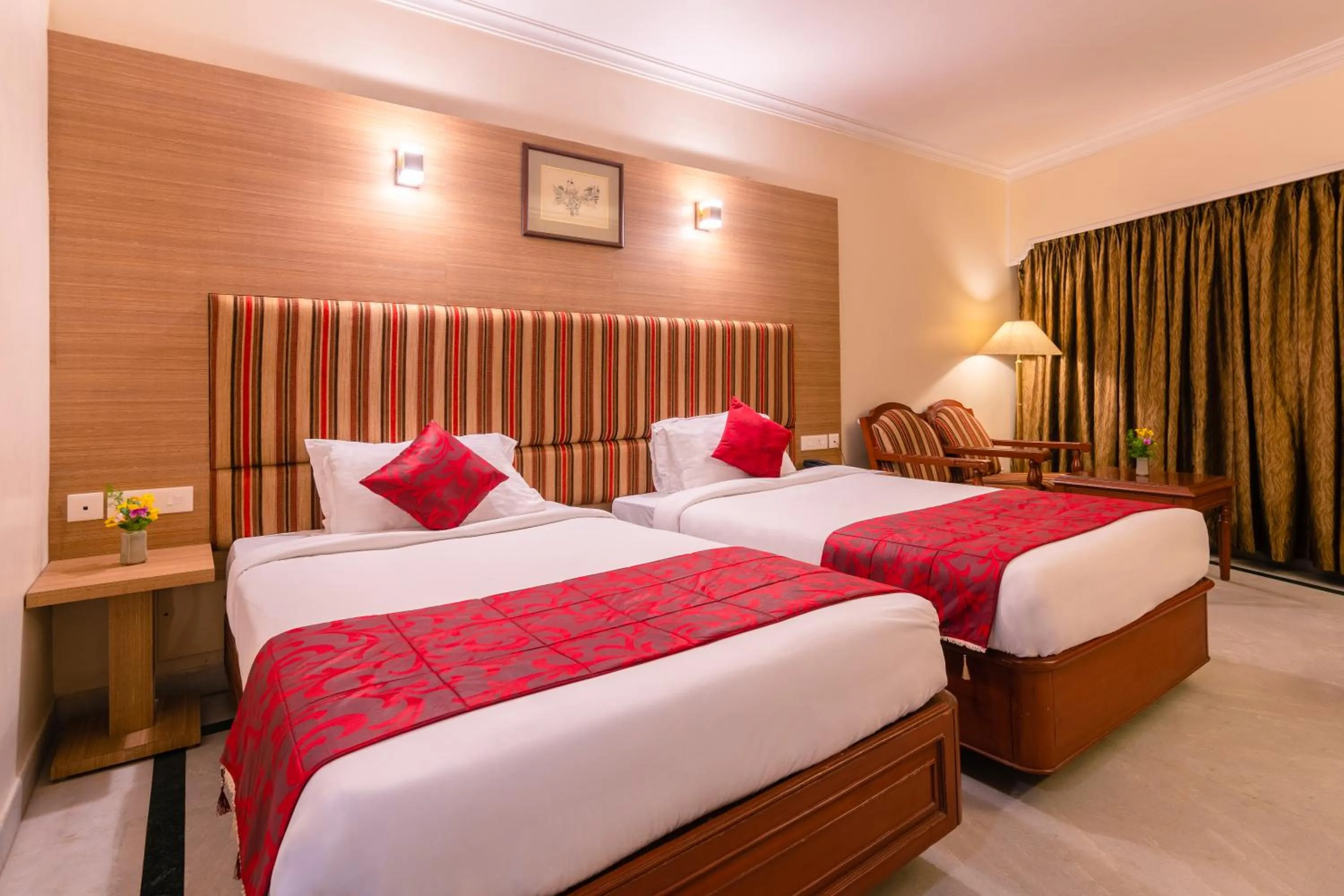Bed in Hotel Annamalai International