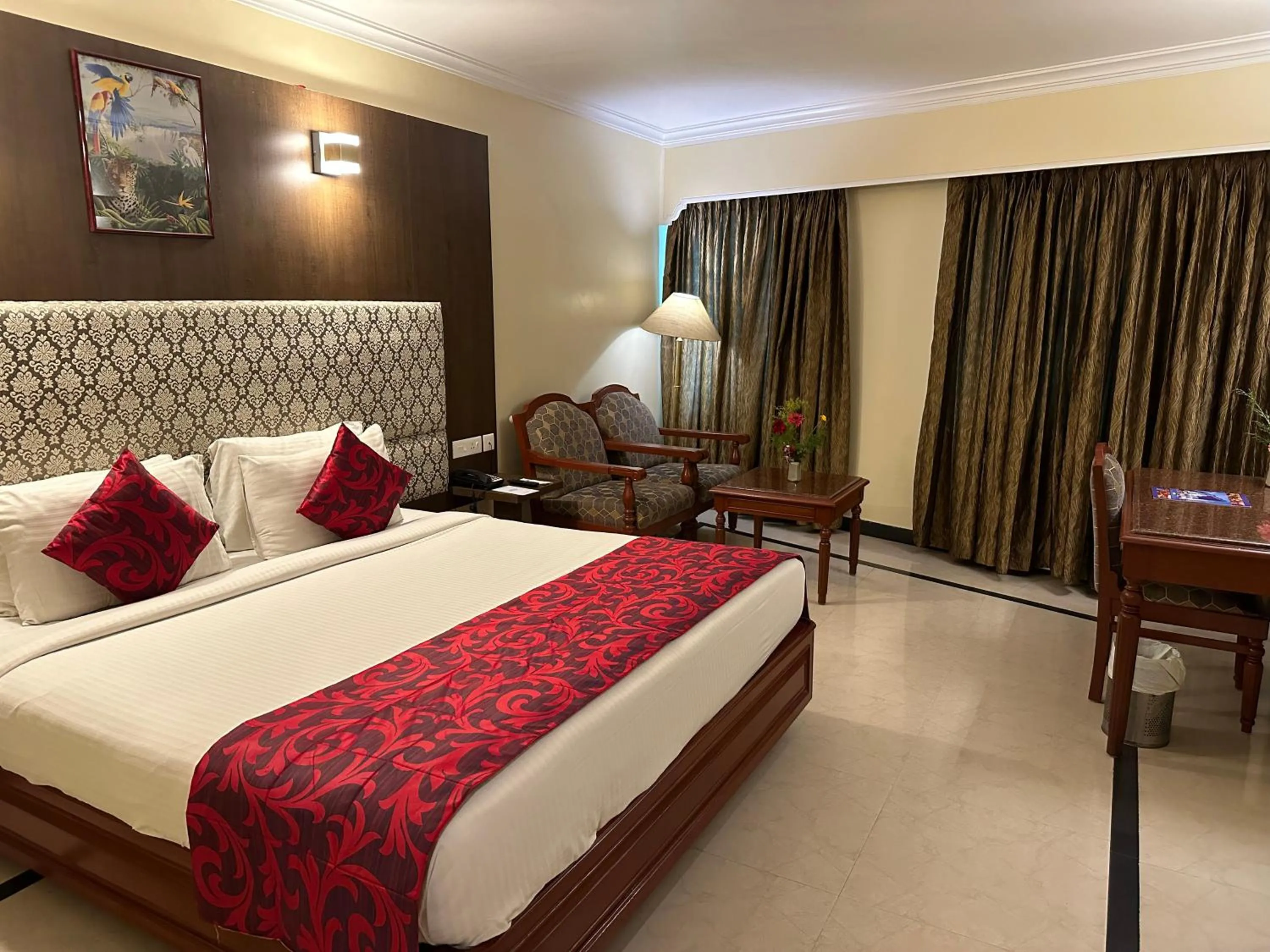 Bed in Hotel Annamalai International