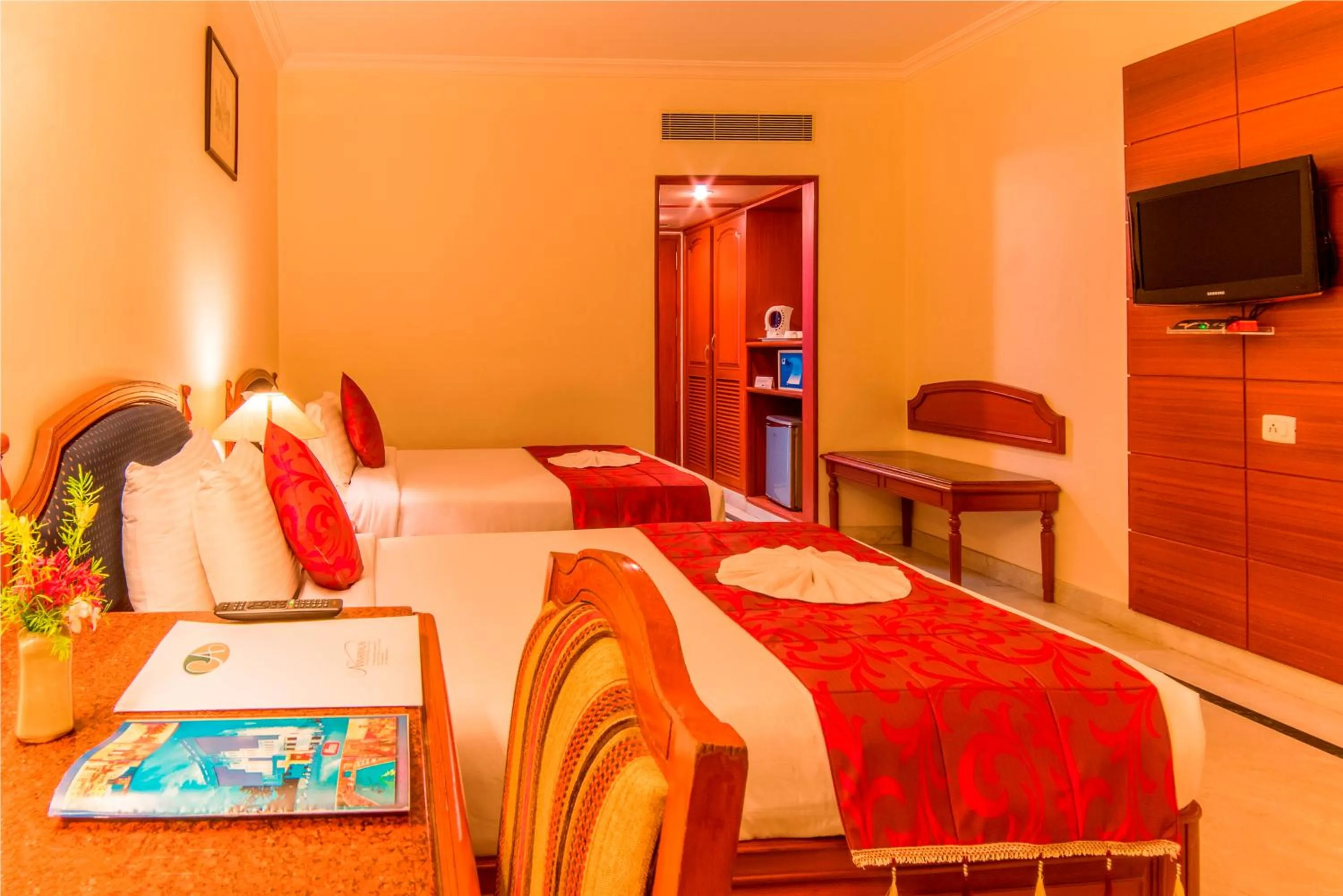 Bed in Hotel Annamalai International