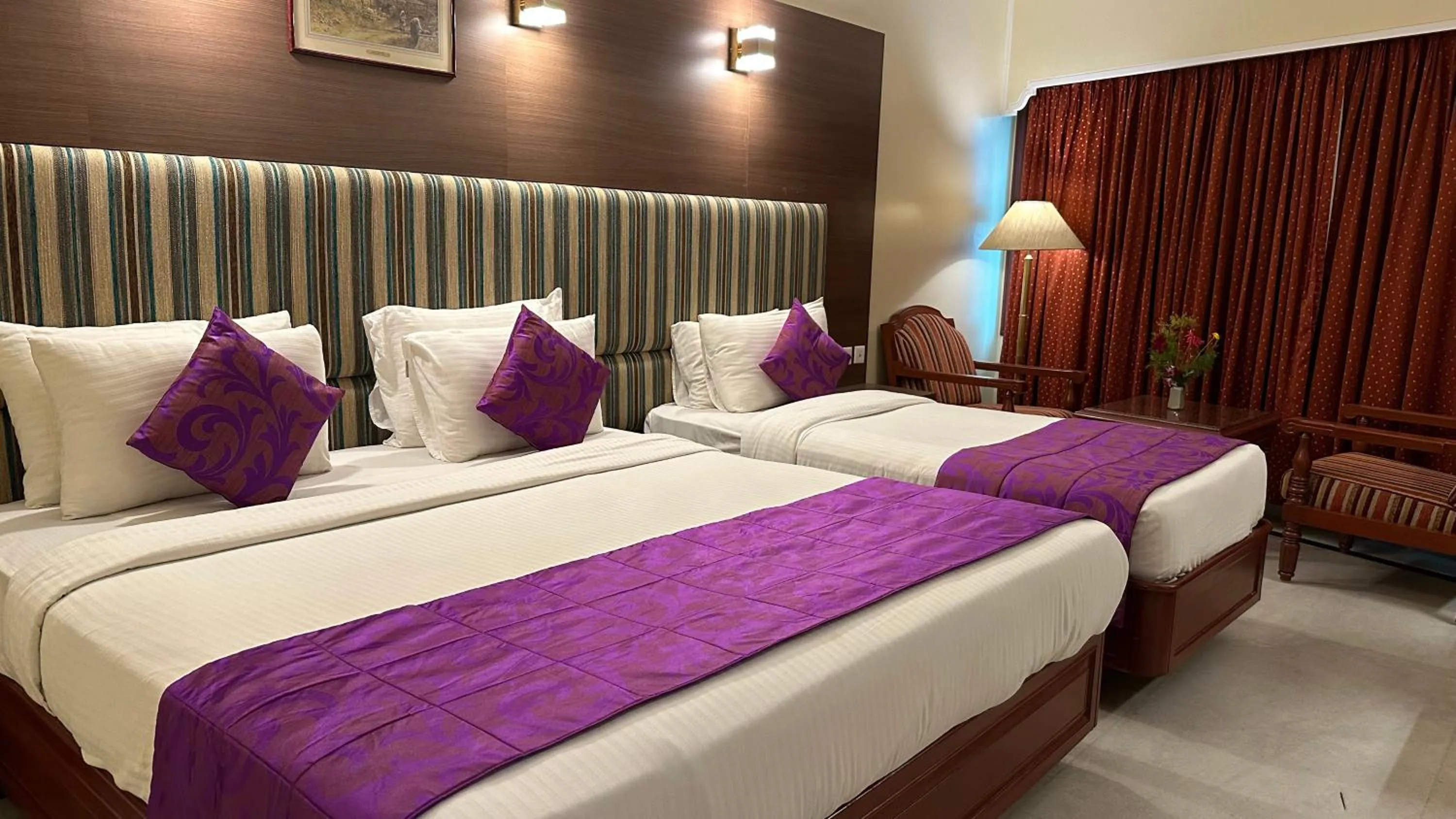 Bed in Hotel Annamalai International