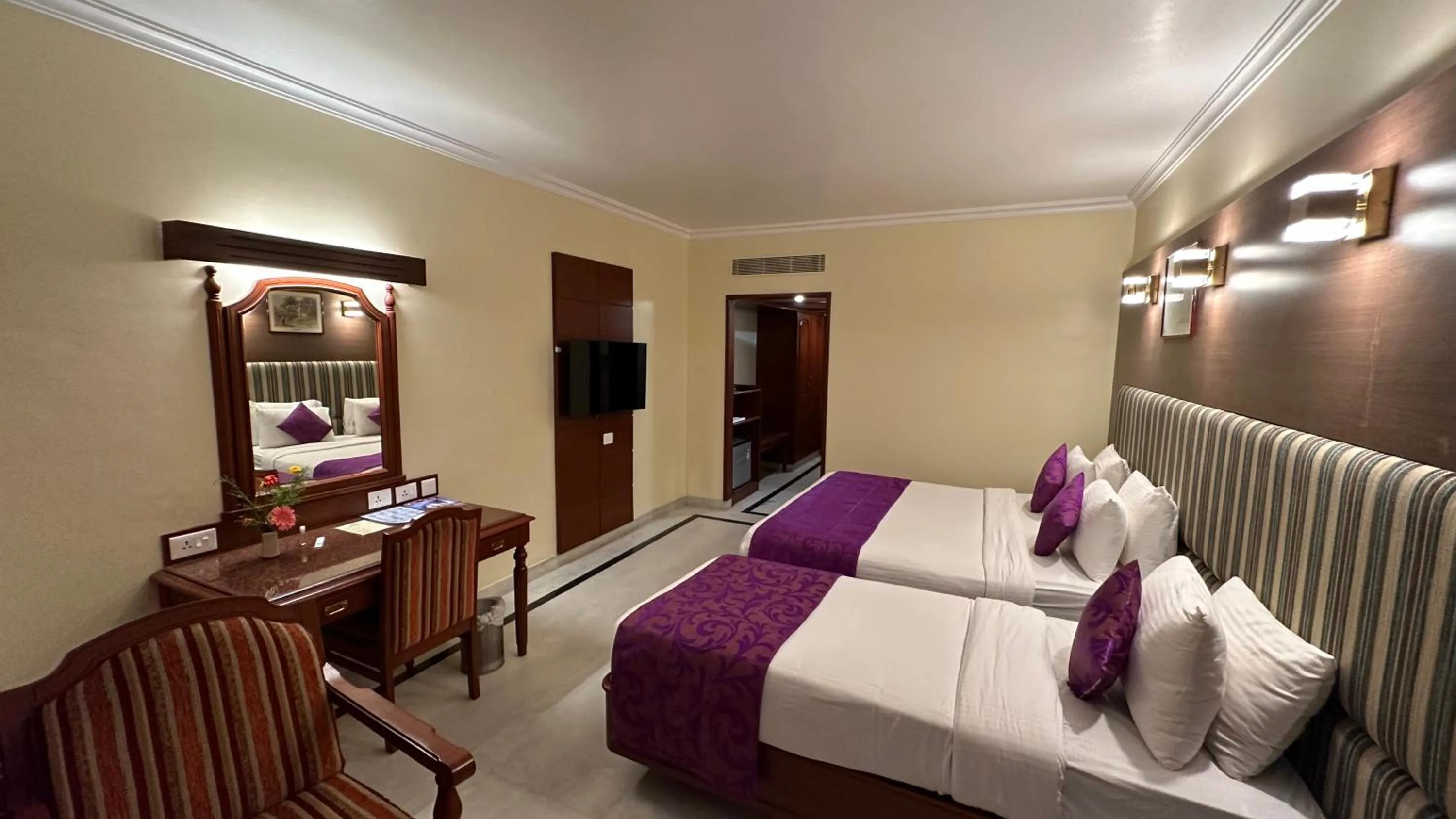 Bed in Hotel Annamalai International