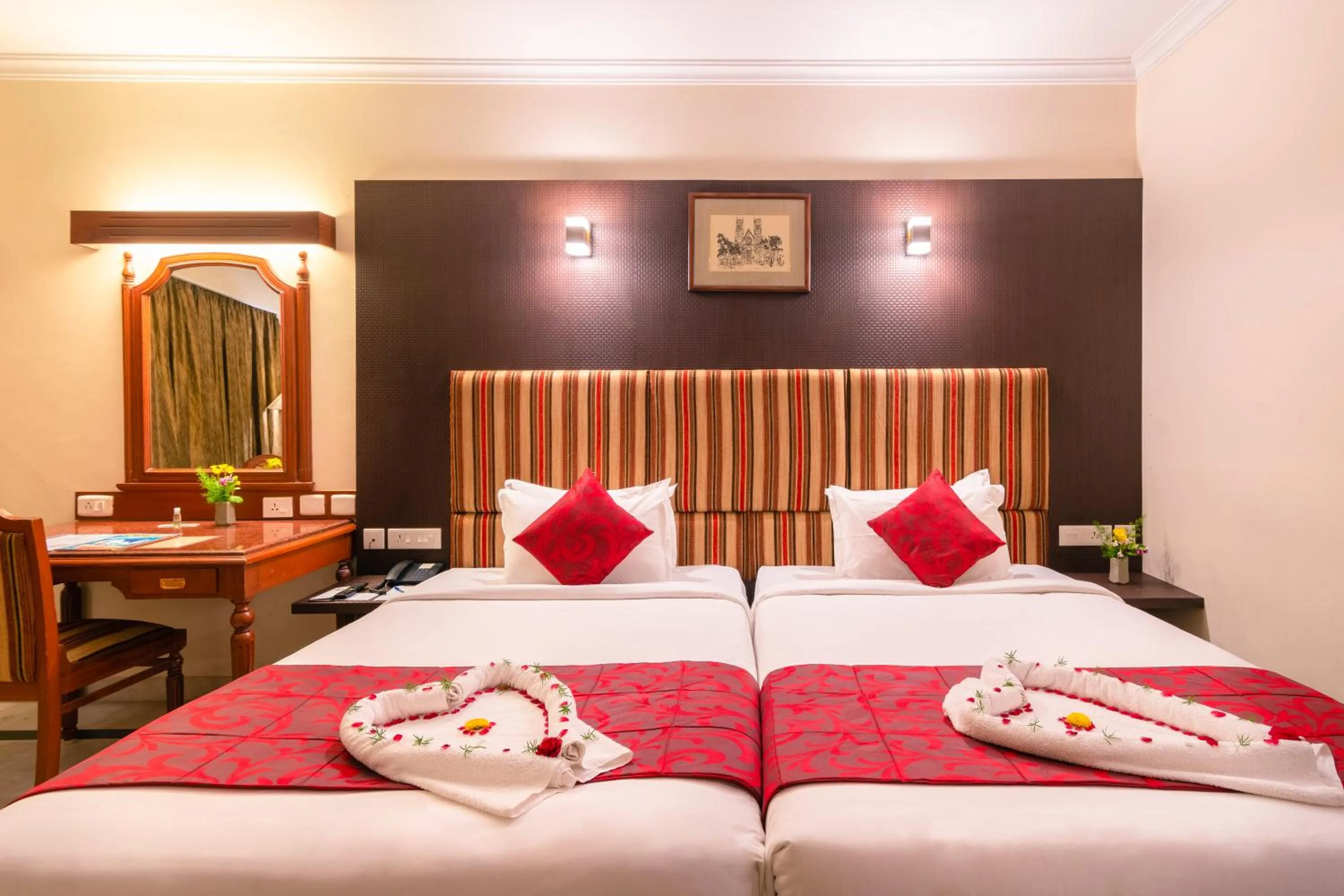 Bed in Hotel Annamalai International