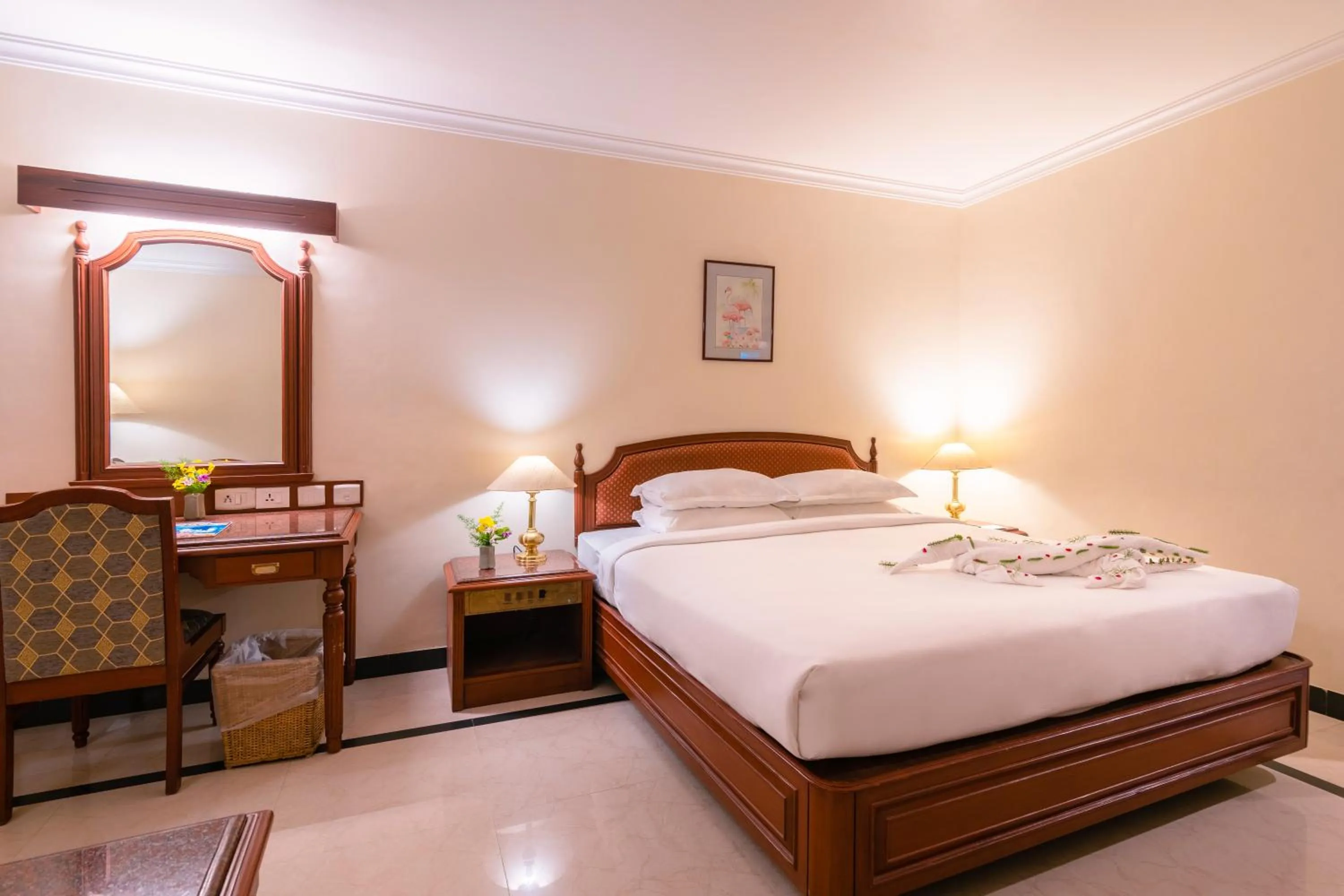 Bed in Hotel Annamalai International