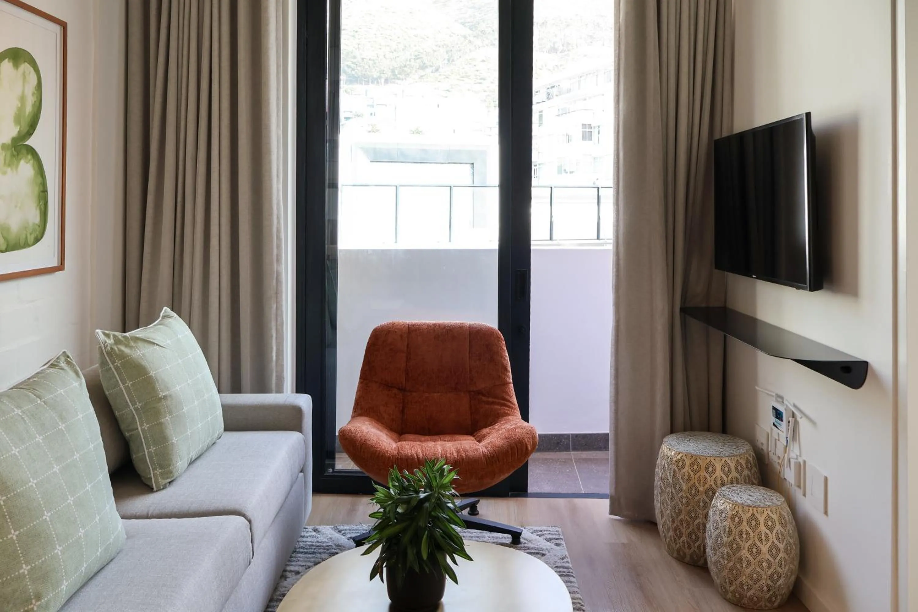 TV and multimedia in EIGHTY2 ON M - Fluent Serviced Apartments