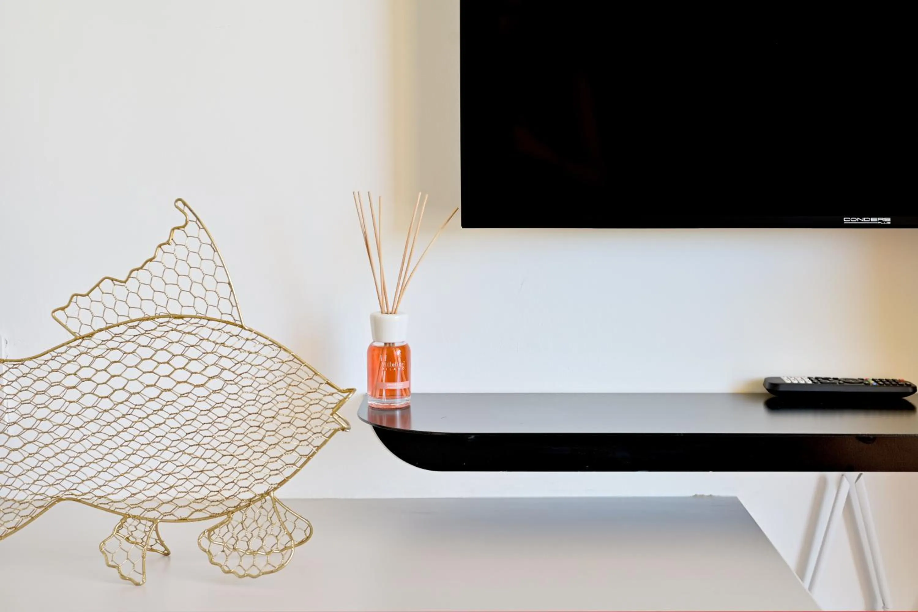 TV and multimedia in EIGHTY2 ON M - Fluent Serviced Apartments