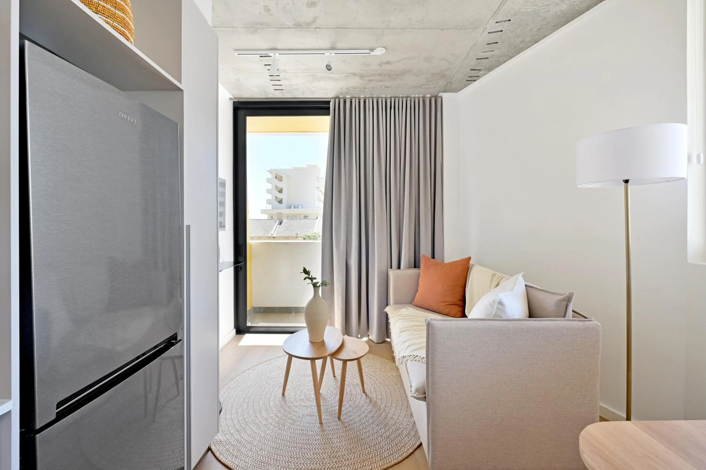 Living room in EIGHTY2 ON M - Fluent Serviced Apartments