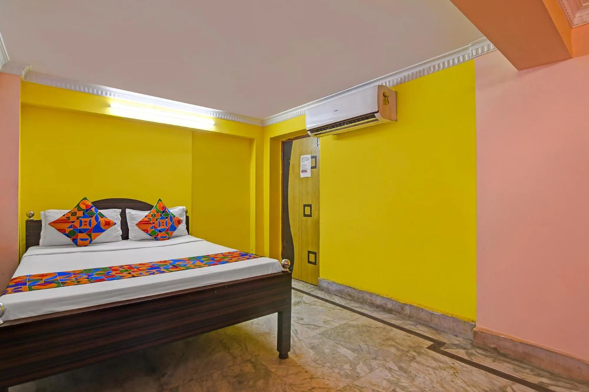 Bed in FabHotel Relyef Inn