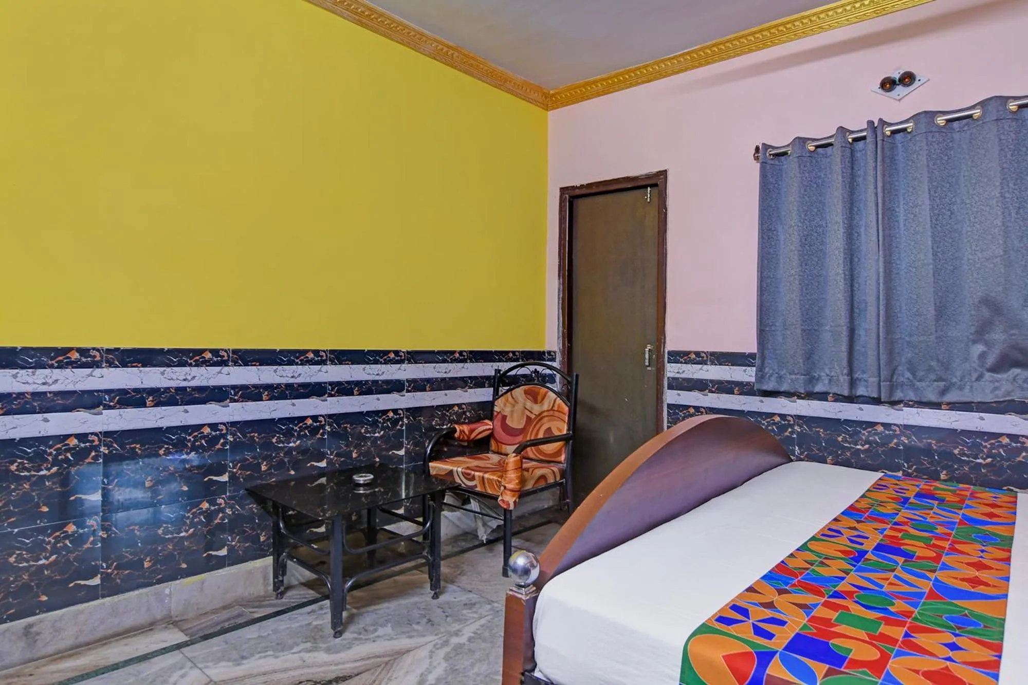 Bed in FabHotel Relyef Inn