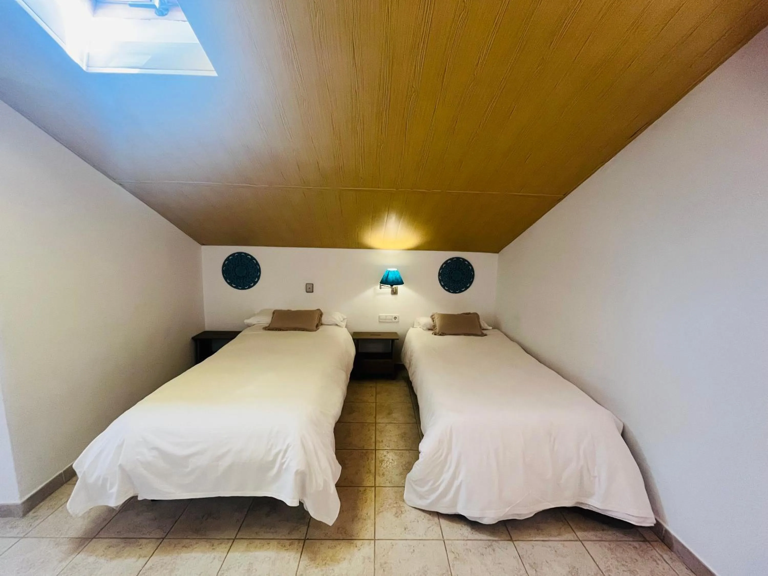 Bed in HOTEL MUSEO Lucainena