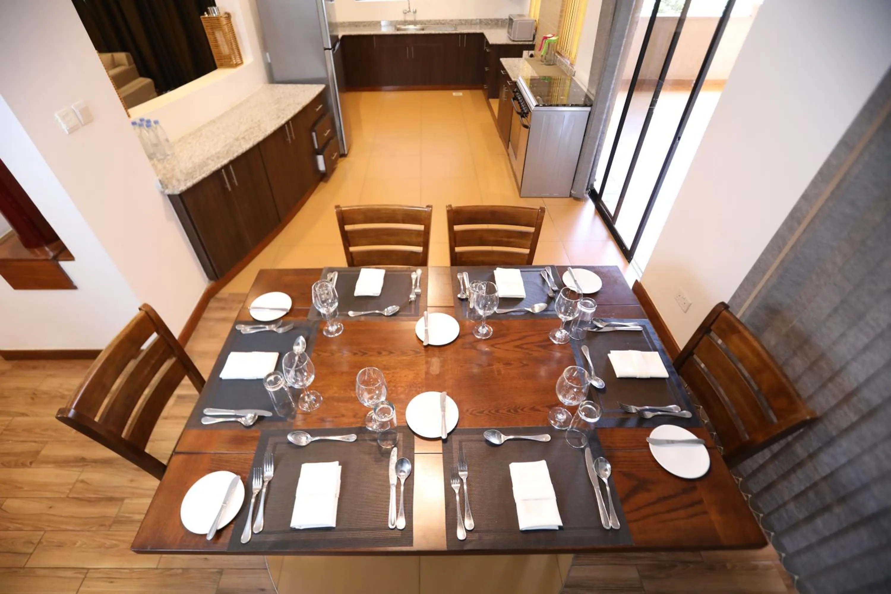 Kitchen or kitchenette in Bidwood Suite Hotel