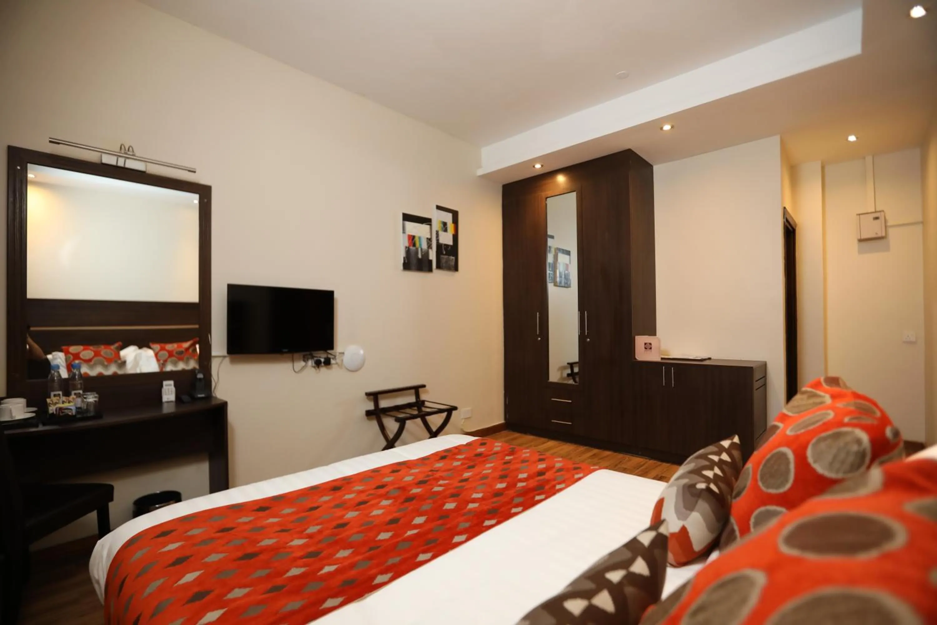 Bed in Bidwood Suite Hotel