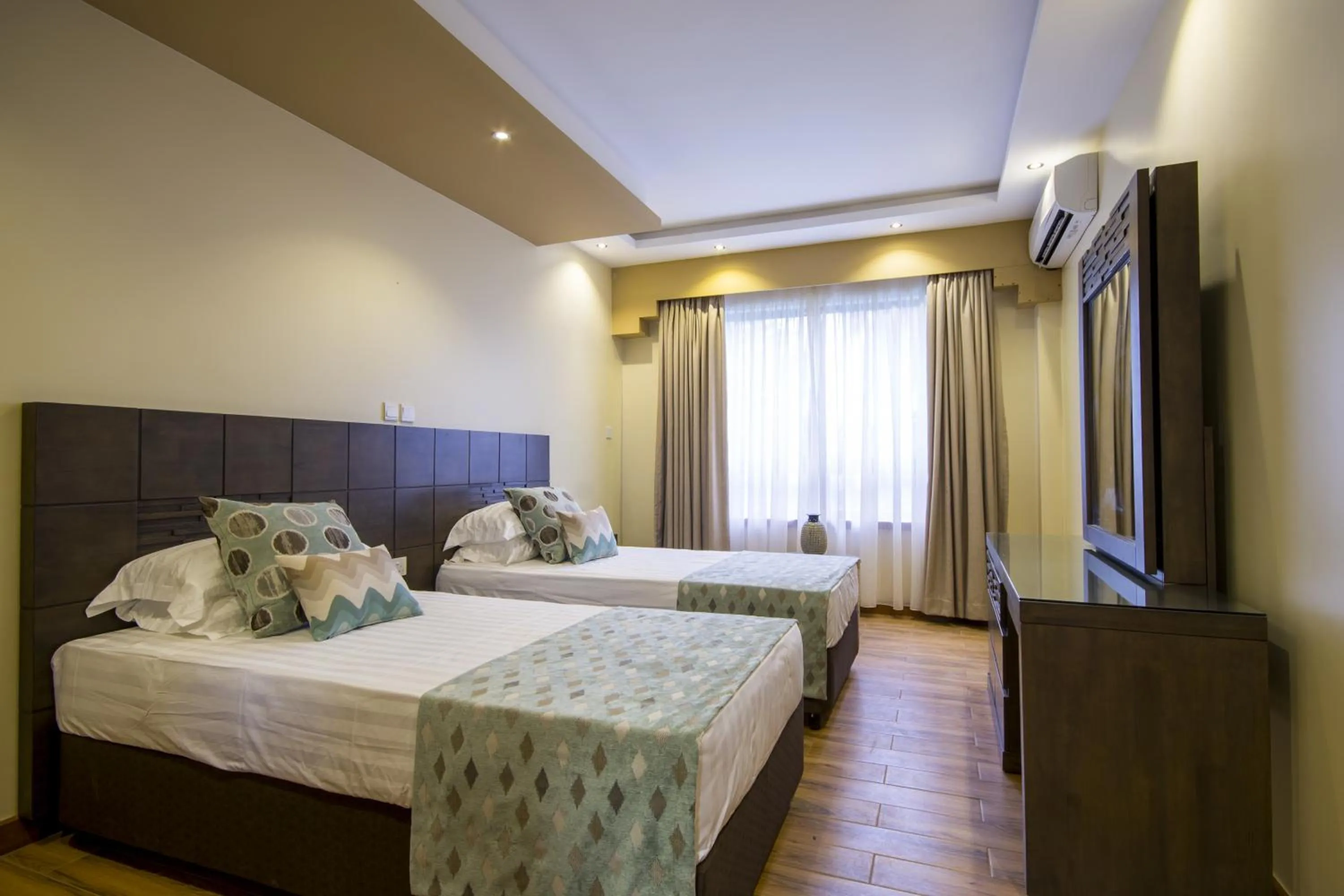 Day, Bed in Bidwood Suite Hotel