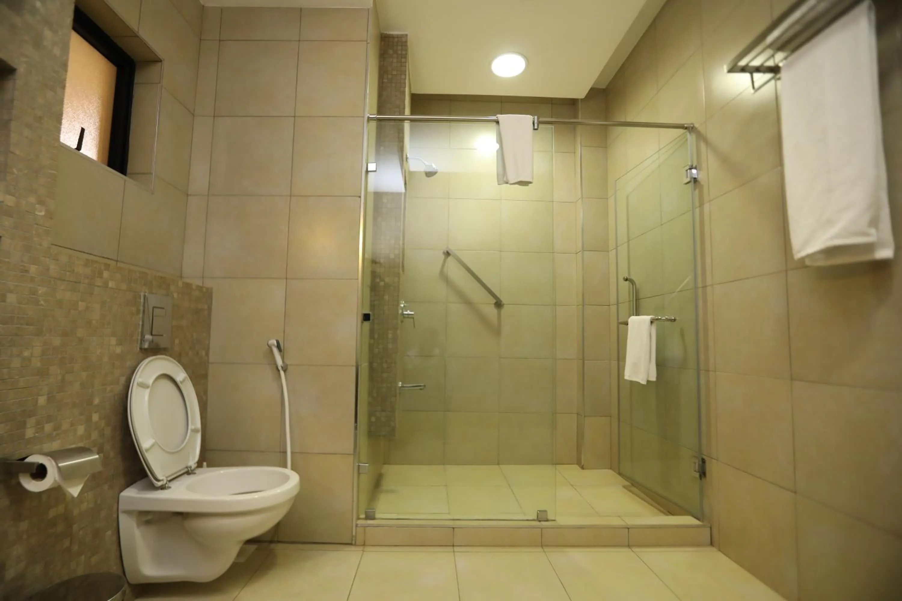 Bathroom in Bidwood Suite Hotel