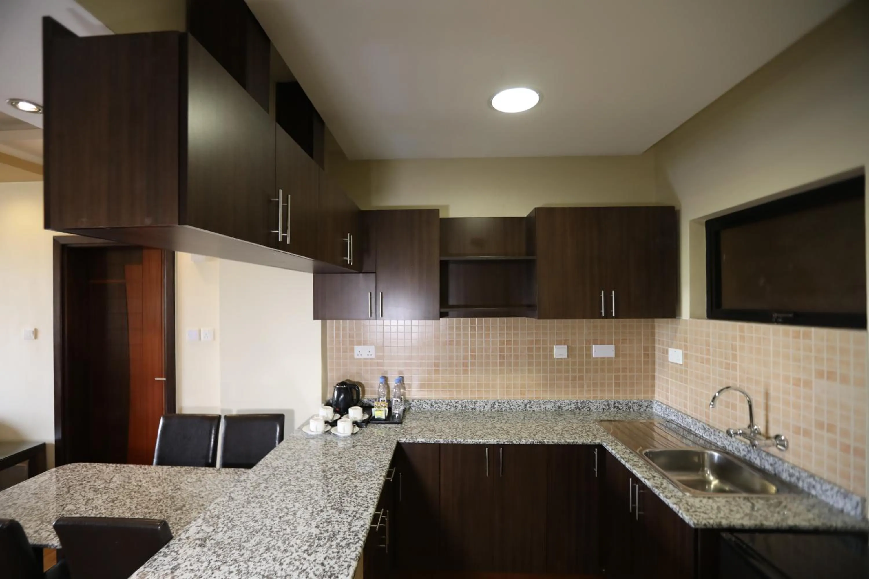 Coffee/tea facilities in Bidwood Suite Hotel