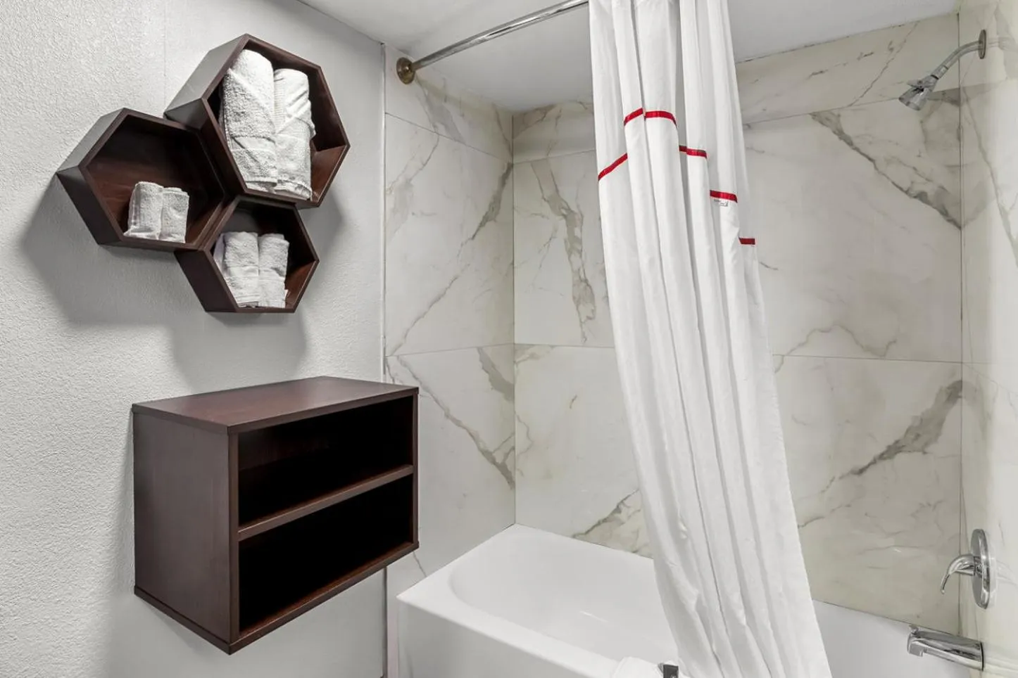 Bathroom in HomeTowne Studios by Red Roof Richmond - Airport Sandston