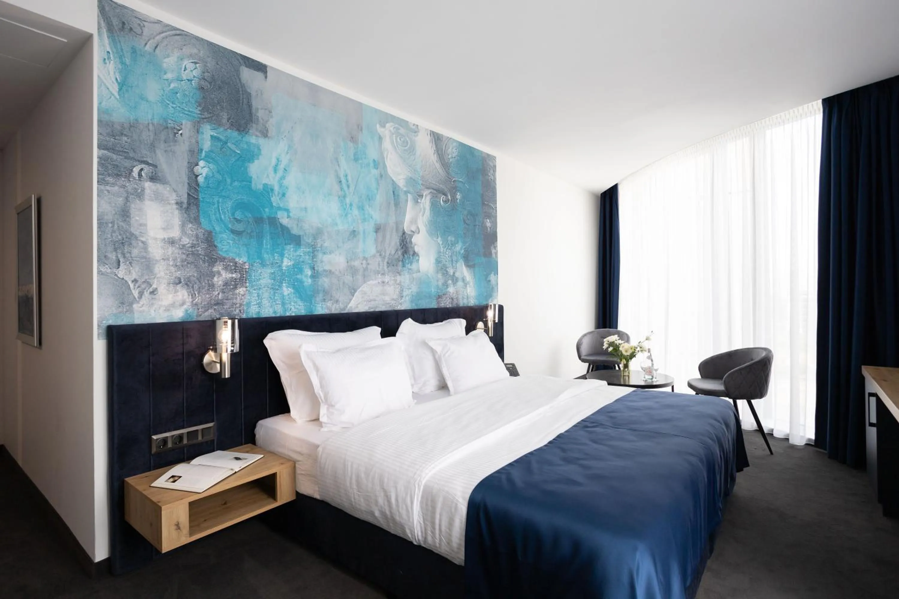 Photo of the whole room, Bed in Blue Star Luxury Hotel