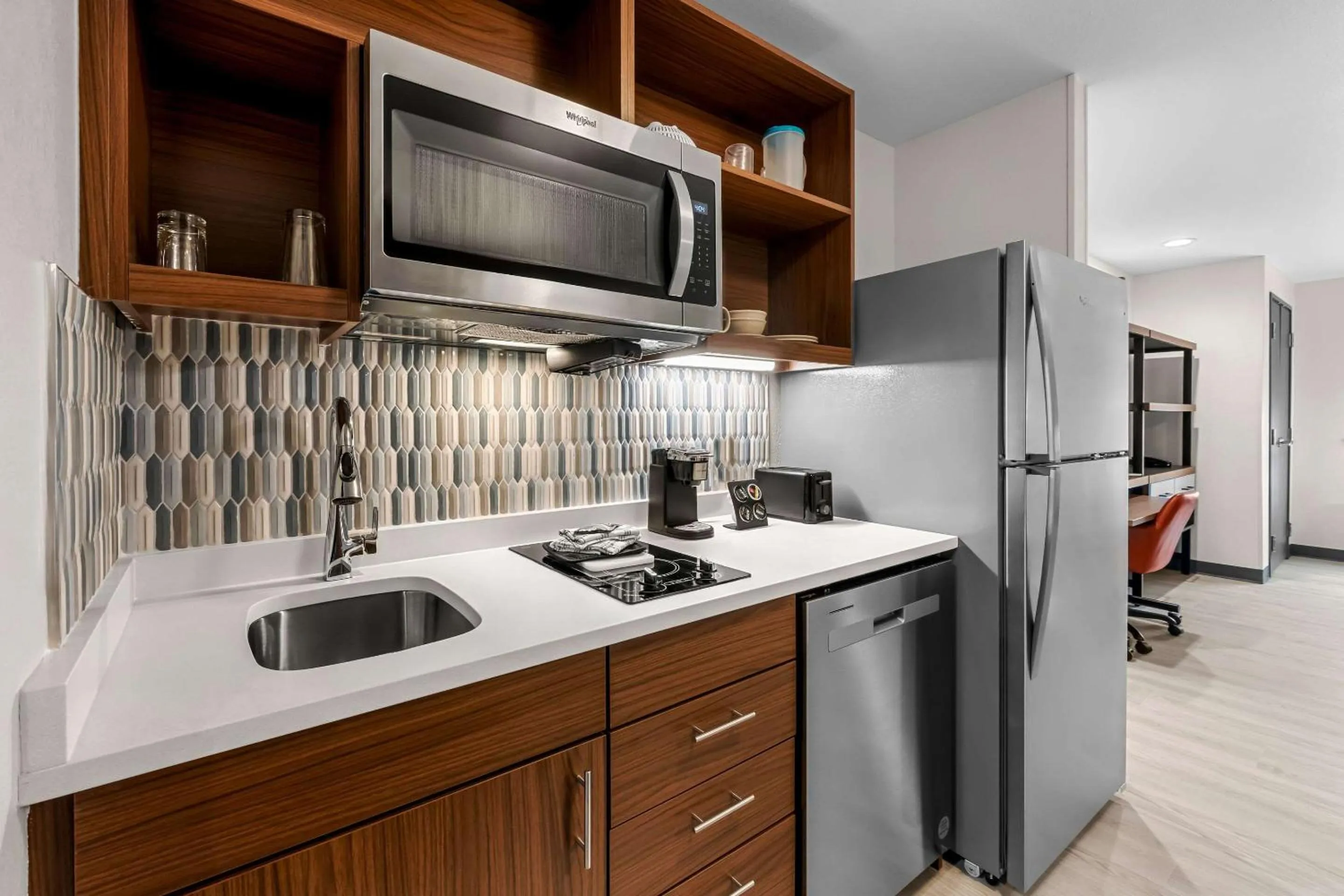 Kitchen or kitchenette in Everhome Suites Fayetteville near Fort Bragg