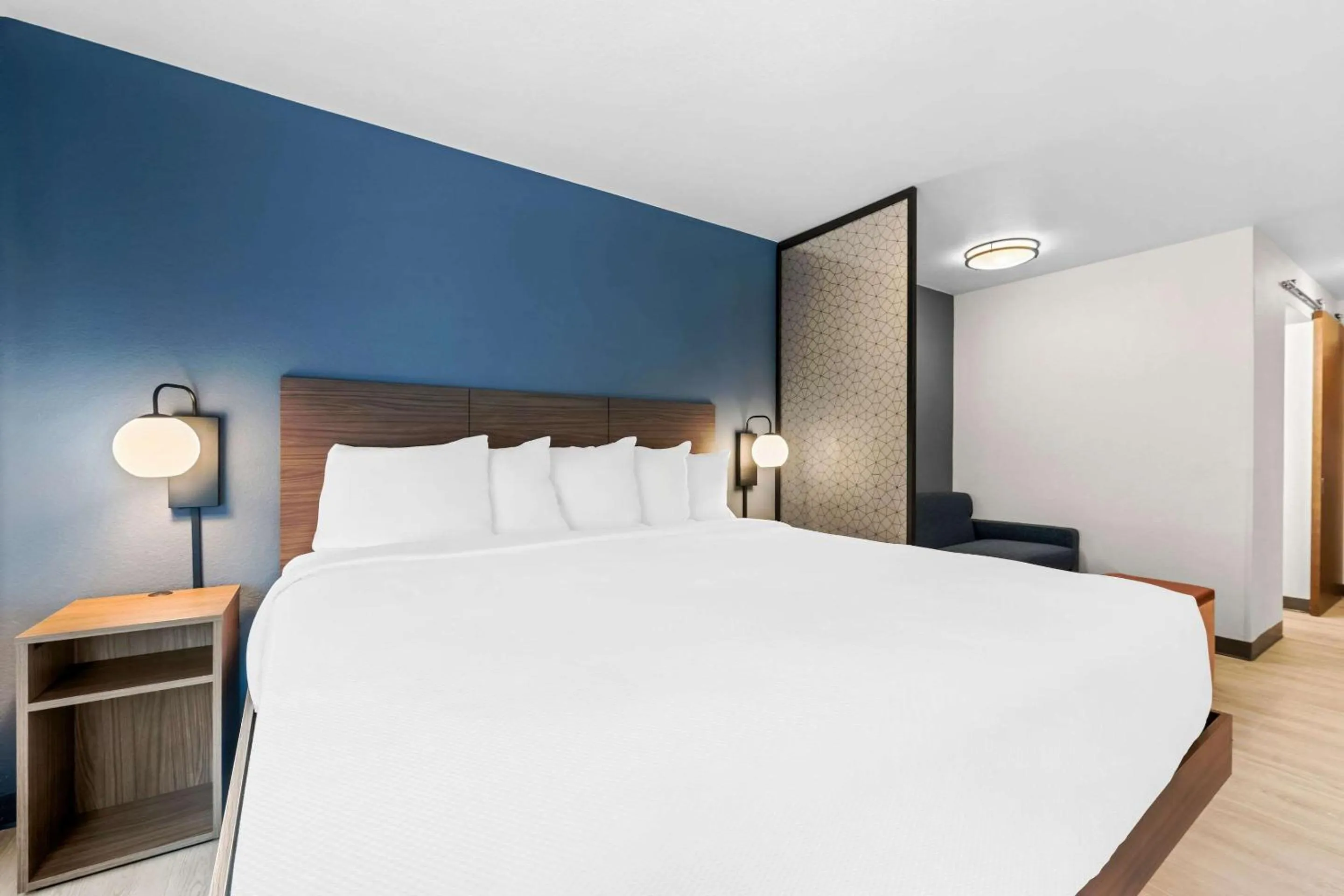 Bed in Everhome Suites Fayetteville near Fort Bragg