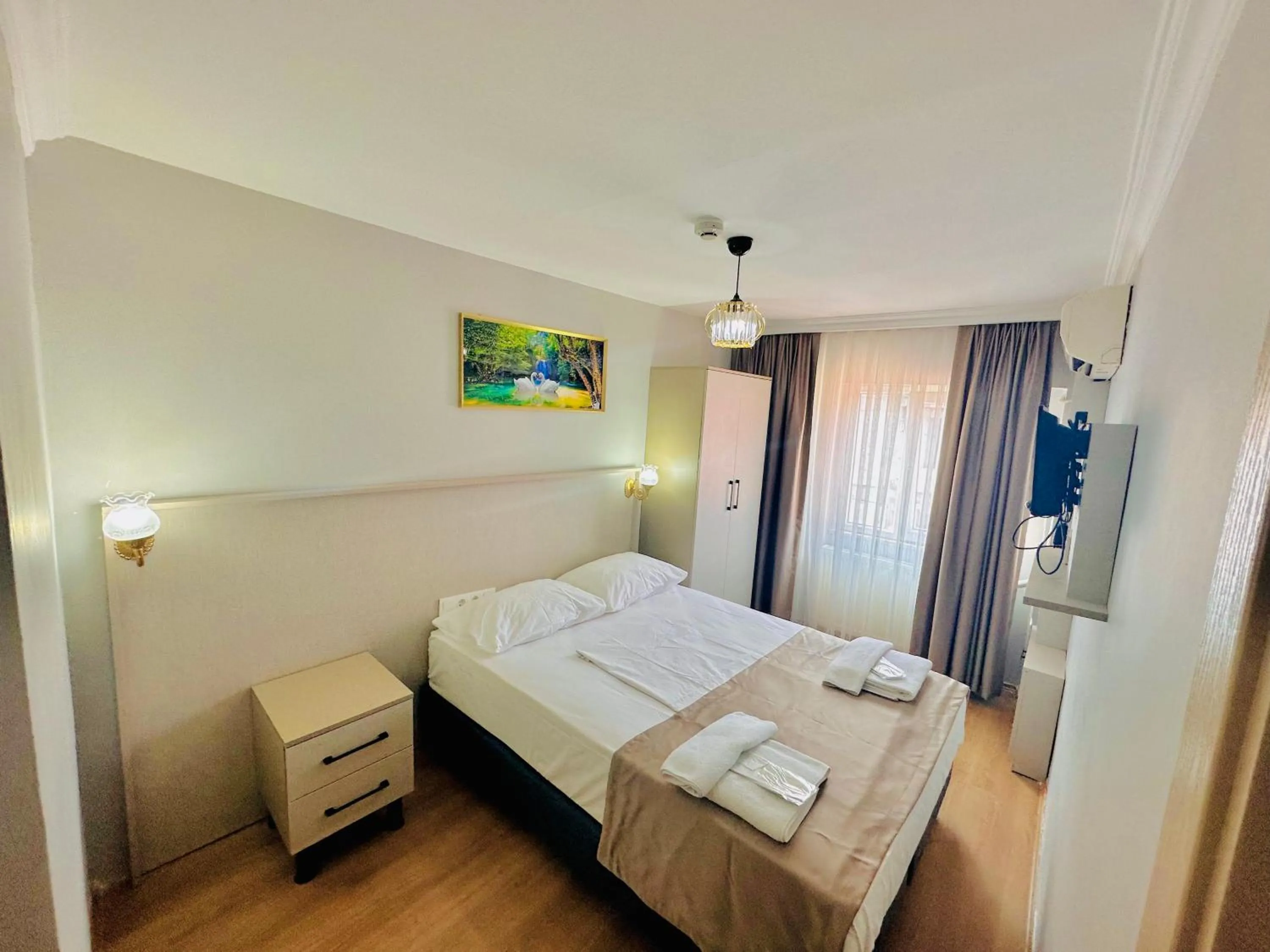 Photo of the whole room, Bed in Crowned Exclusive Hotel