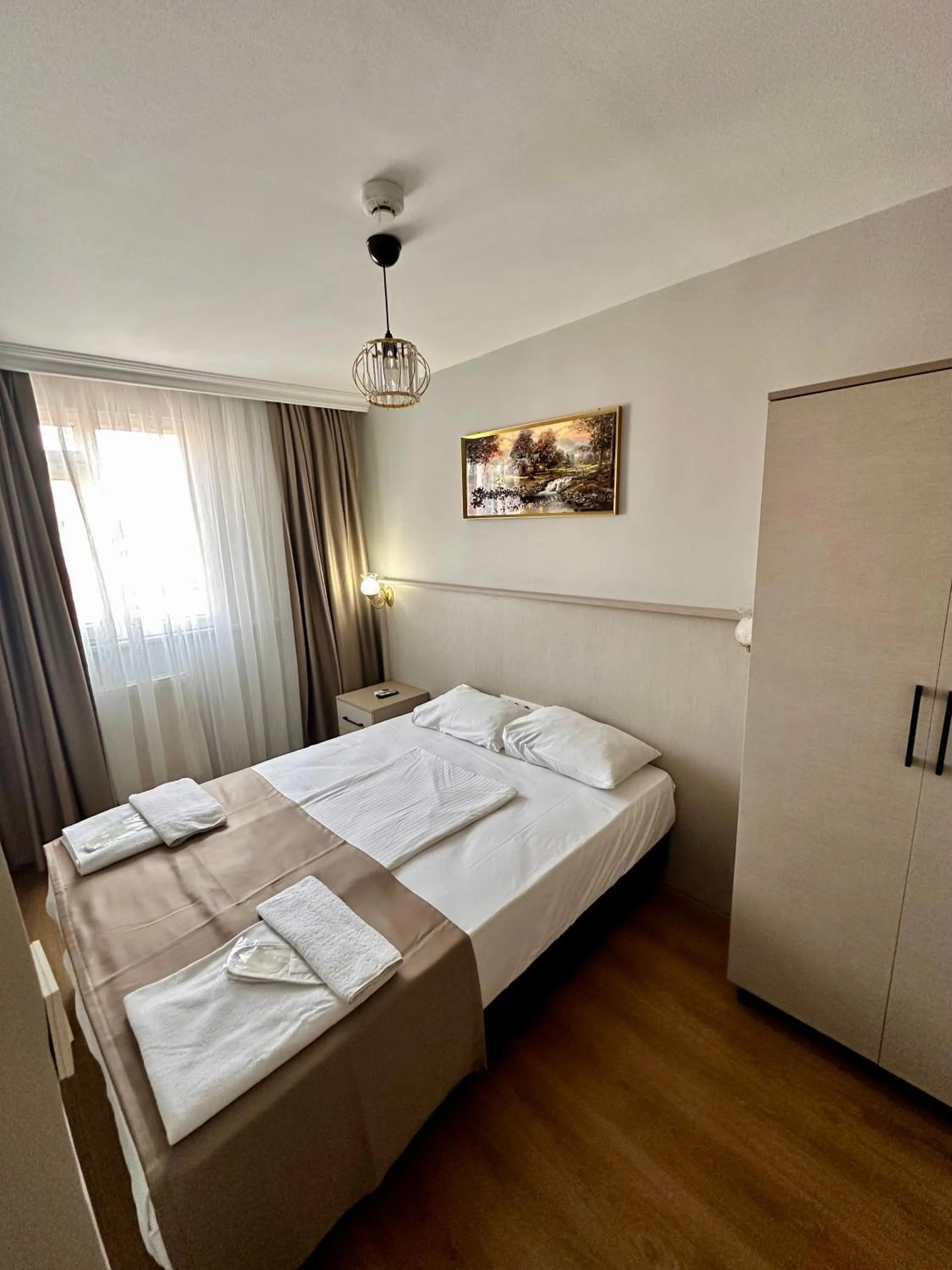 Bed in Crowned Exclusive Hotel