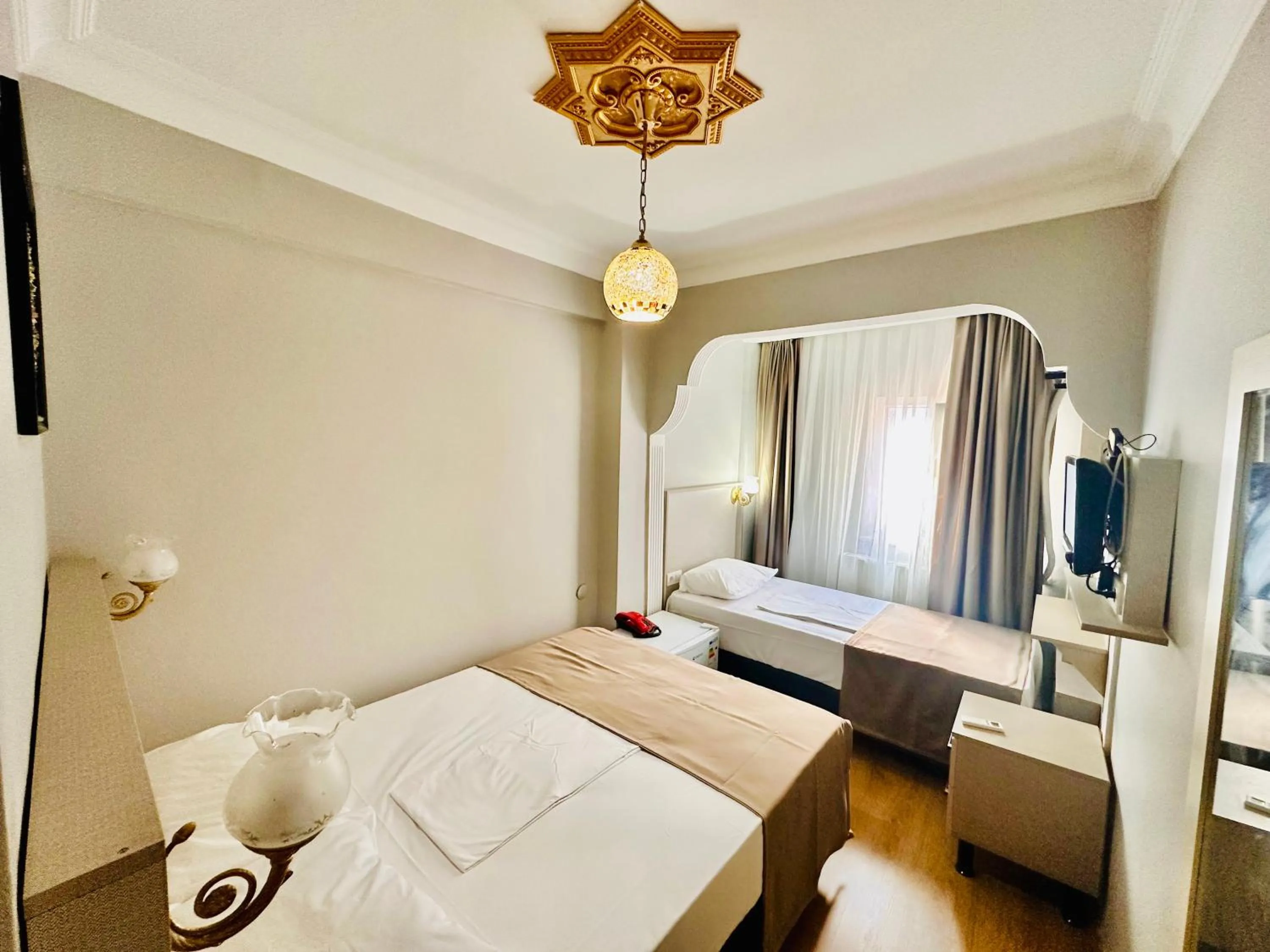 Photo of the whole room, Bed in Crowned Exclusive Hotel