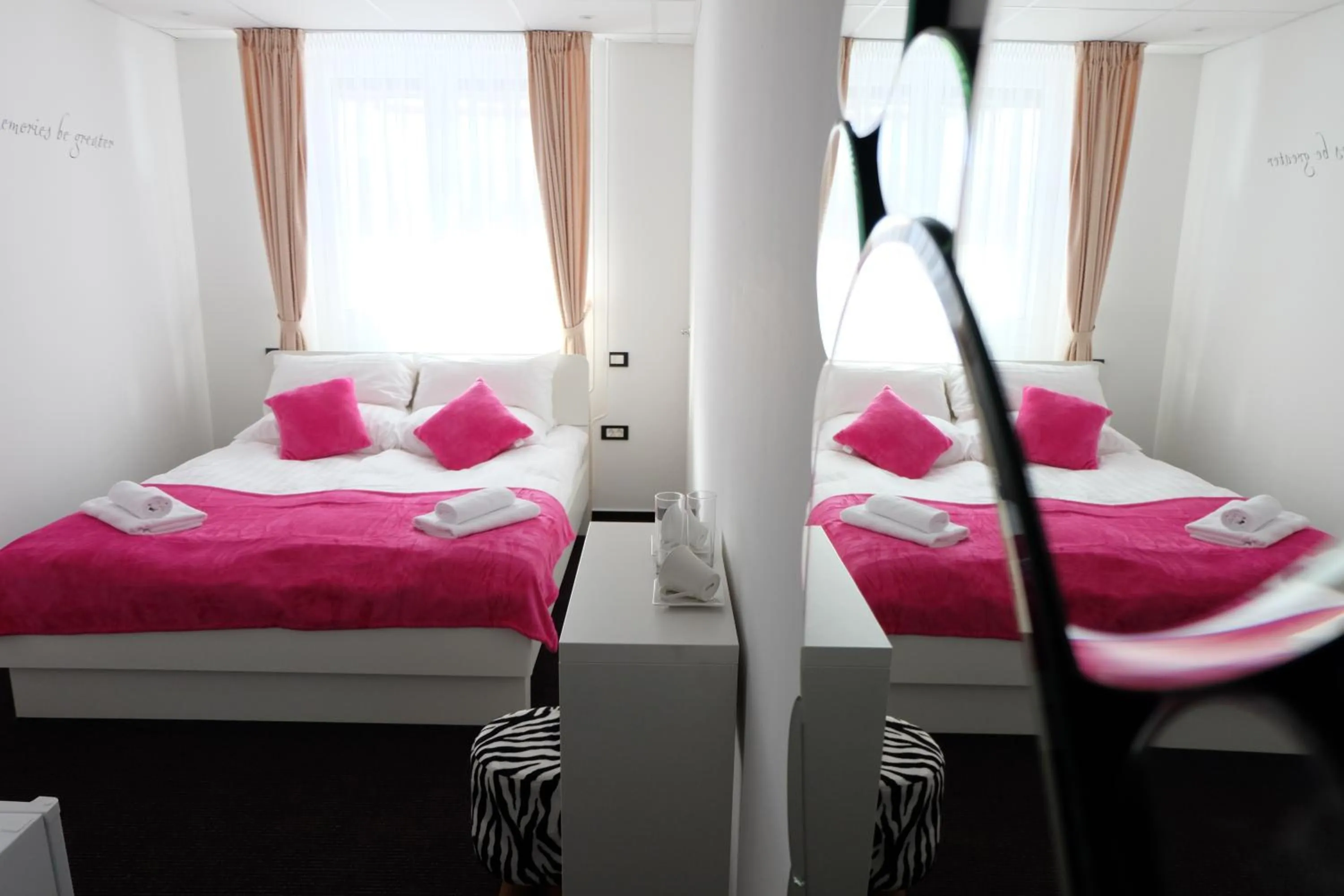 Bed in Luwiana Suites