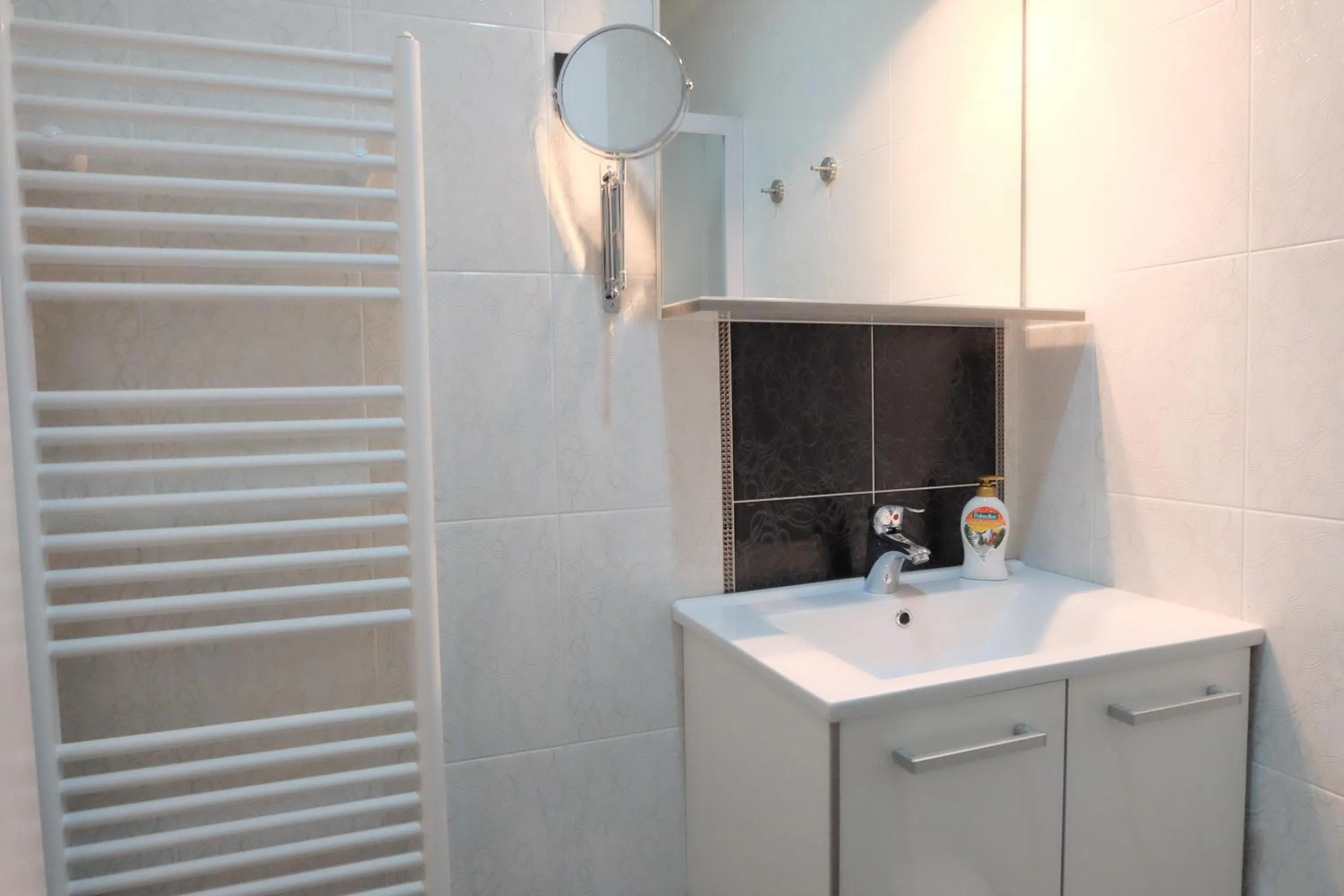 Bathroom in Luwiana Suites