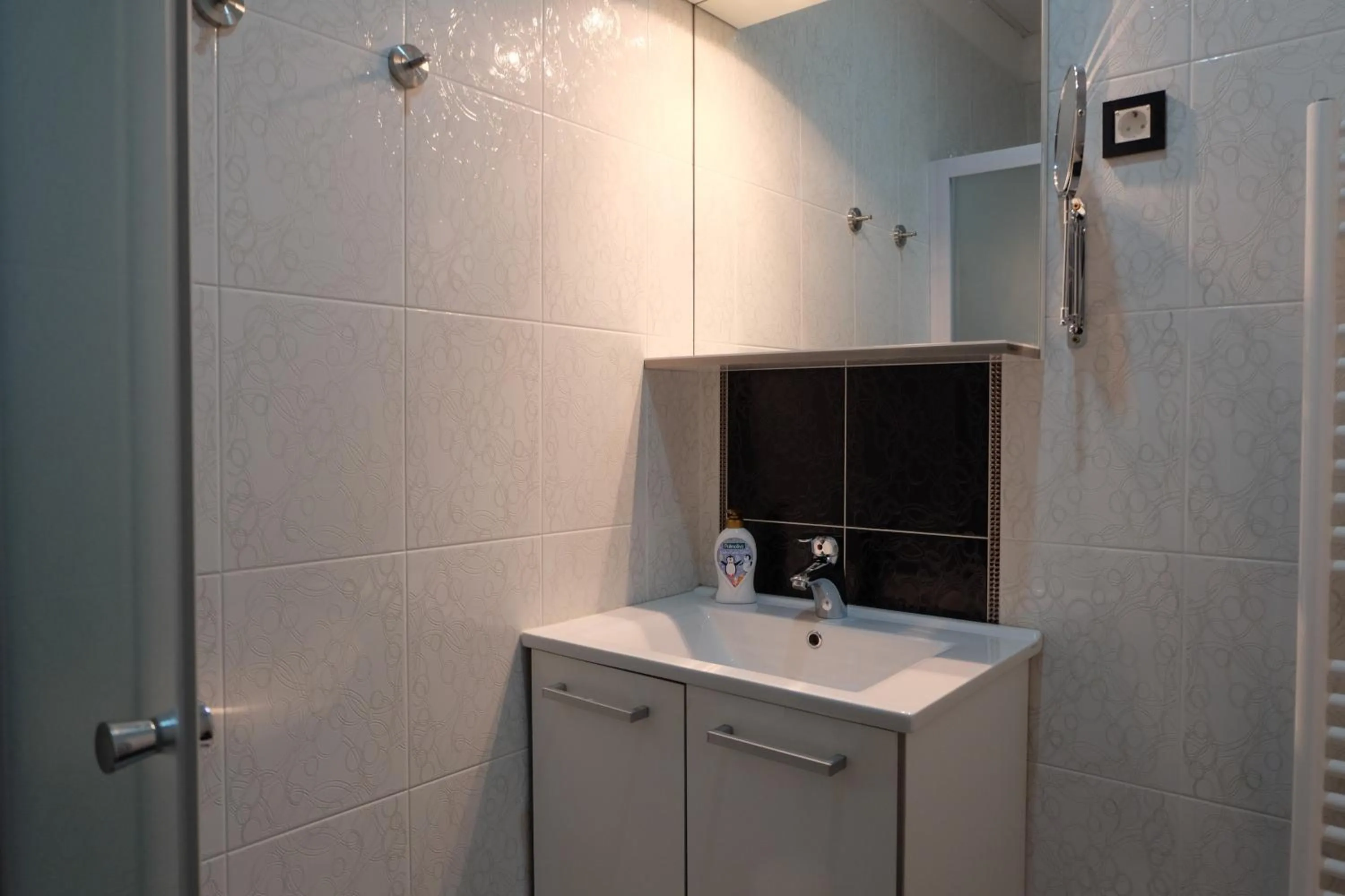 Bathroom in Luwiana Suites