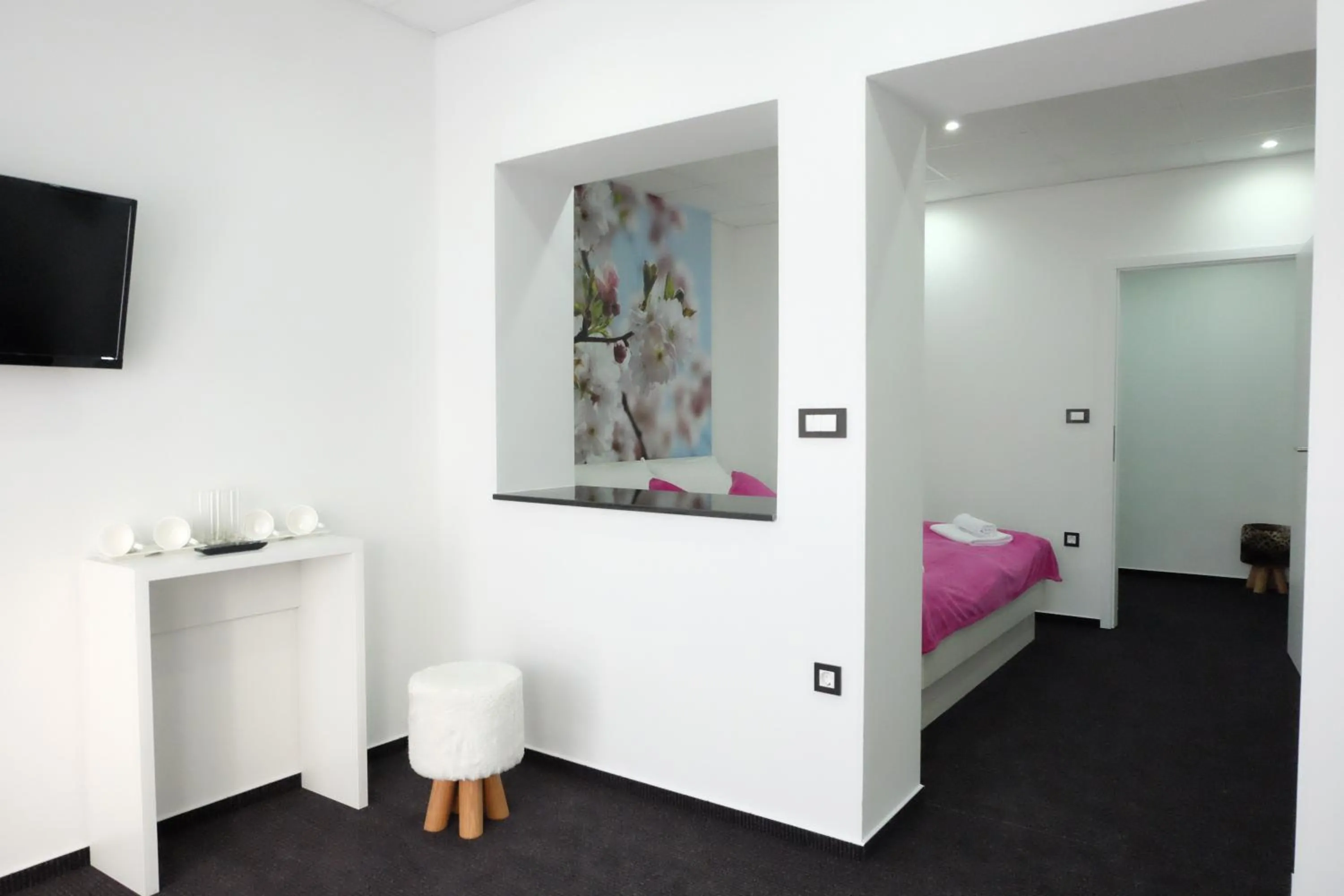 Bed in Luwiana Suites