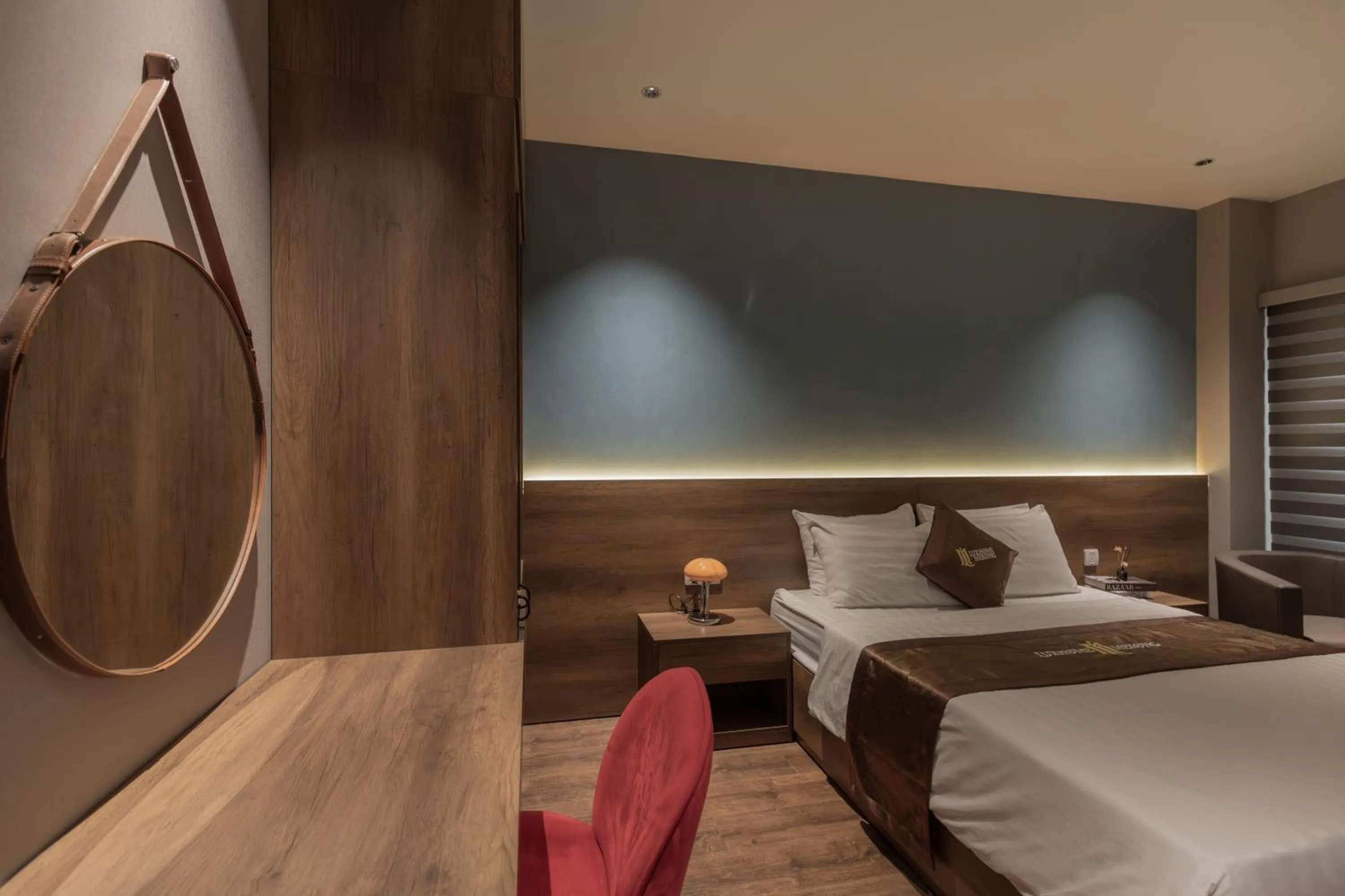 Living room, Bed in Luxhome Mekong Hotel