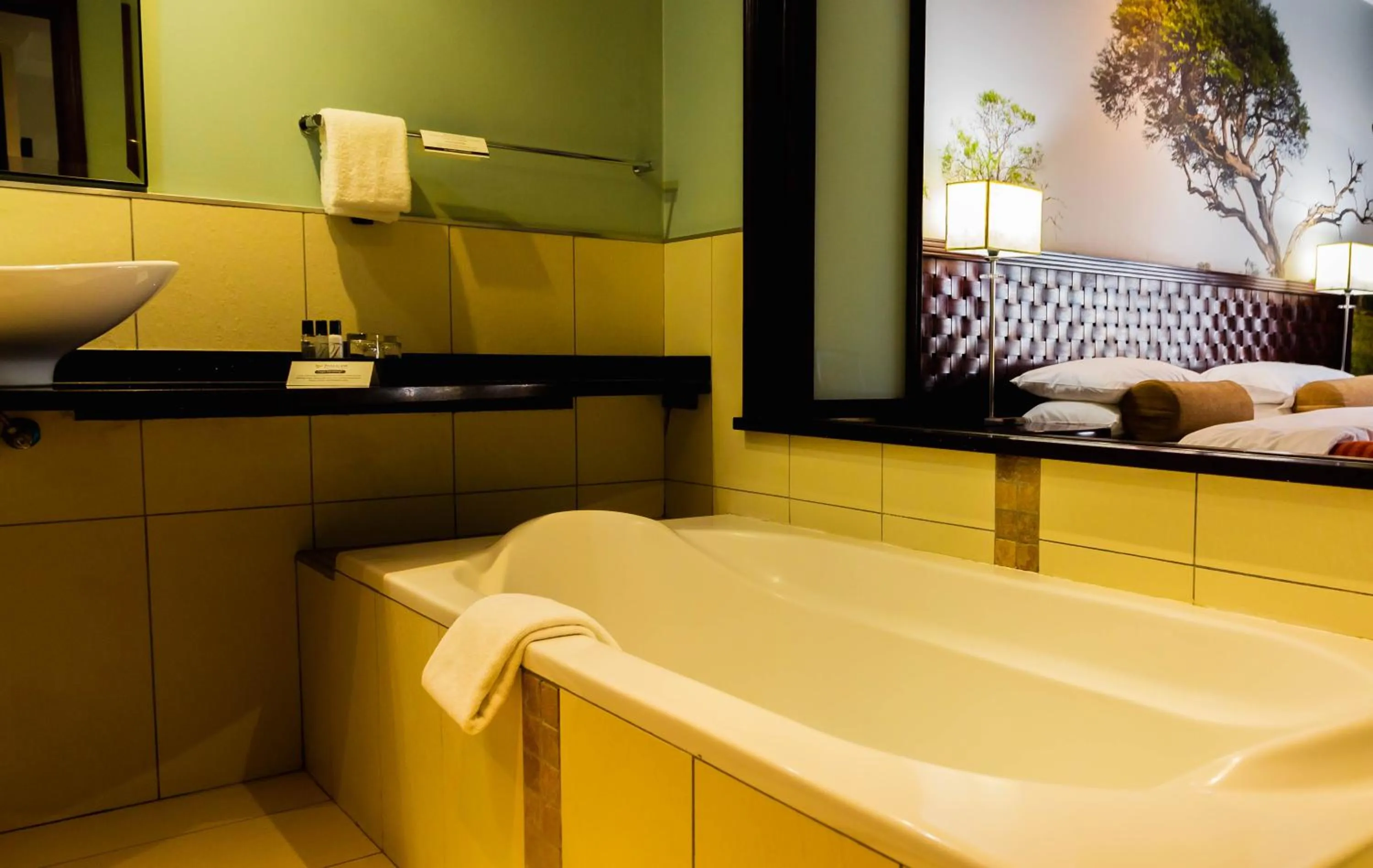 Bathroom, Bed in Phakalane Golf Estate Hotel & Convention Centre