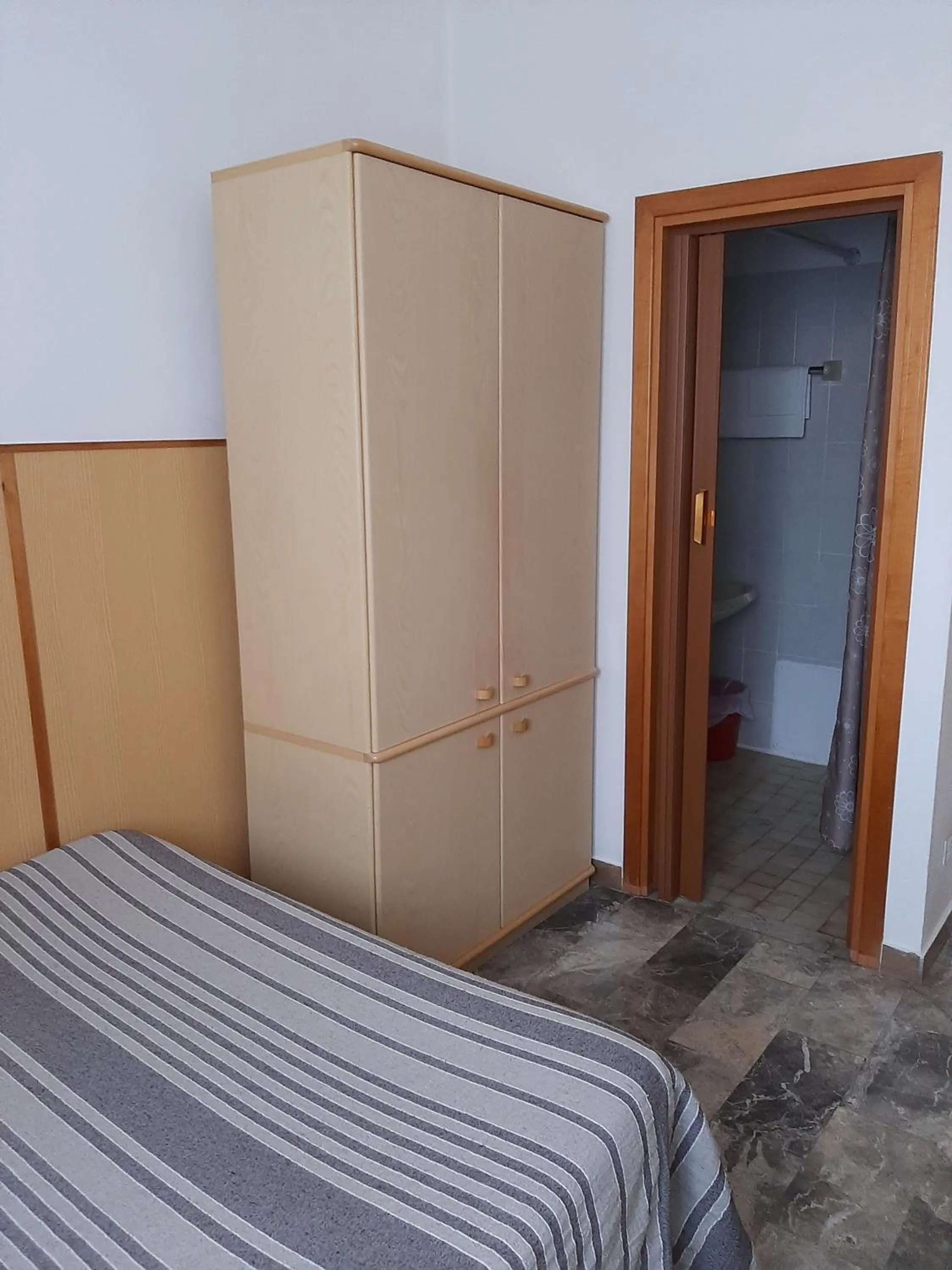 wardrobe, Bed in Hotel Cucciolo
