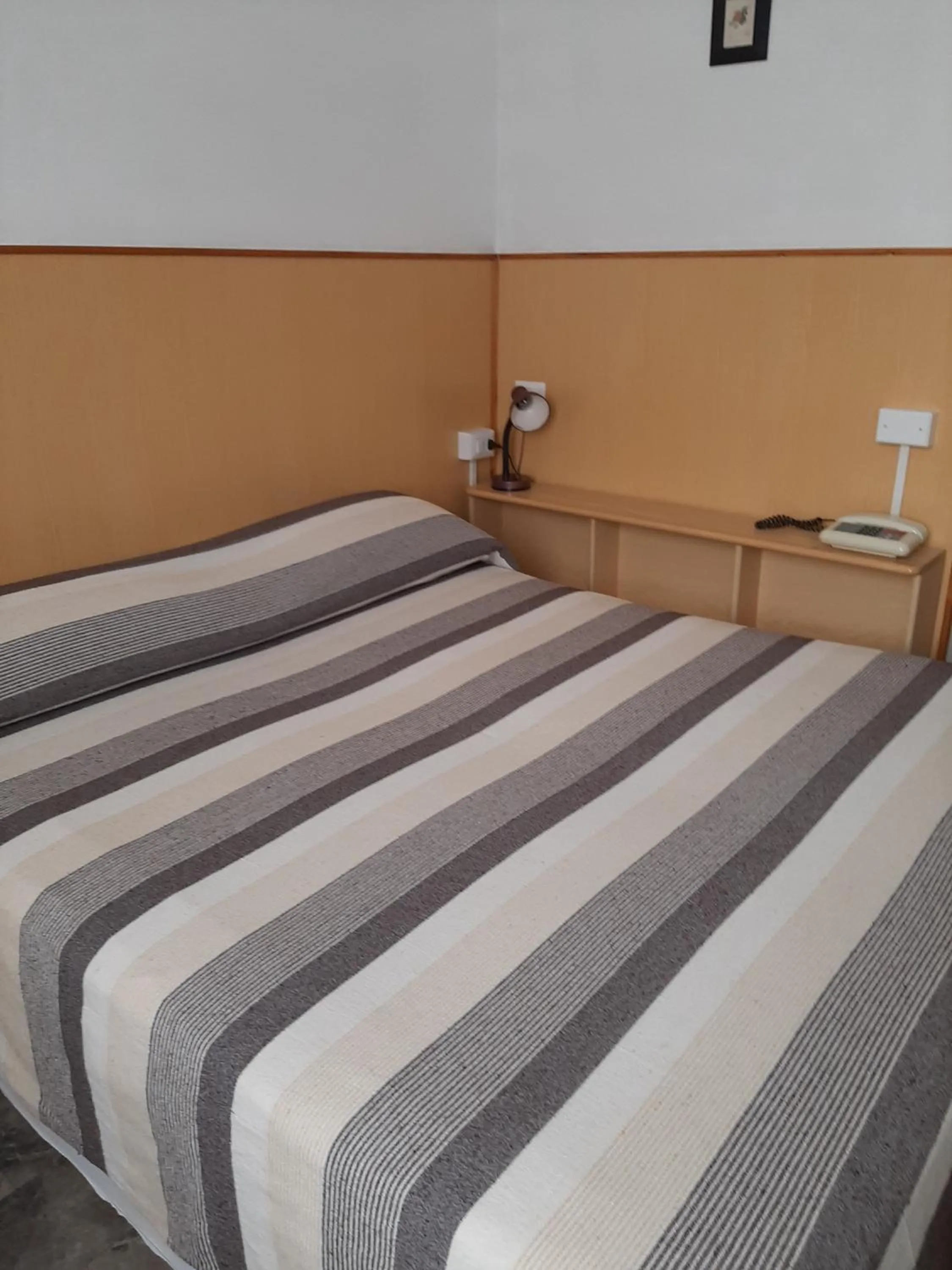 Bed in Hotel Cucciolo