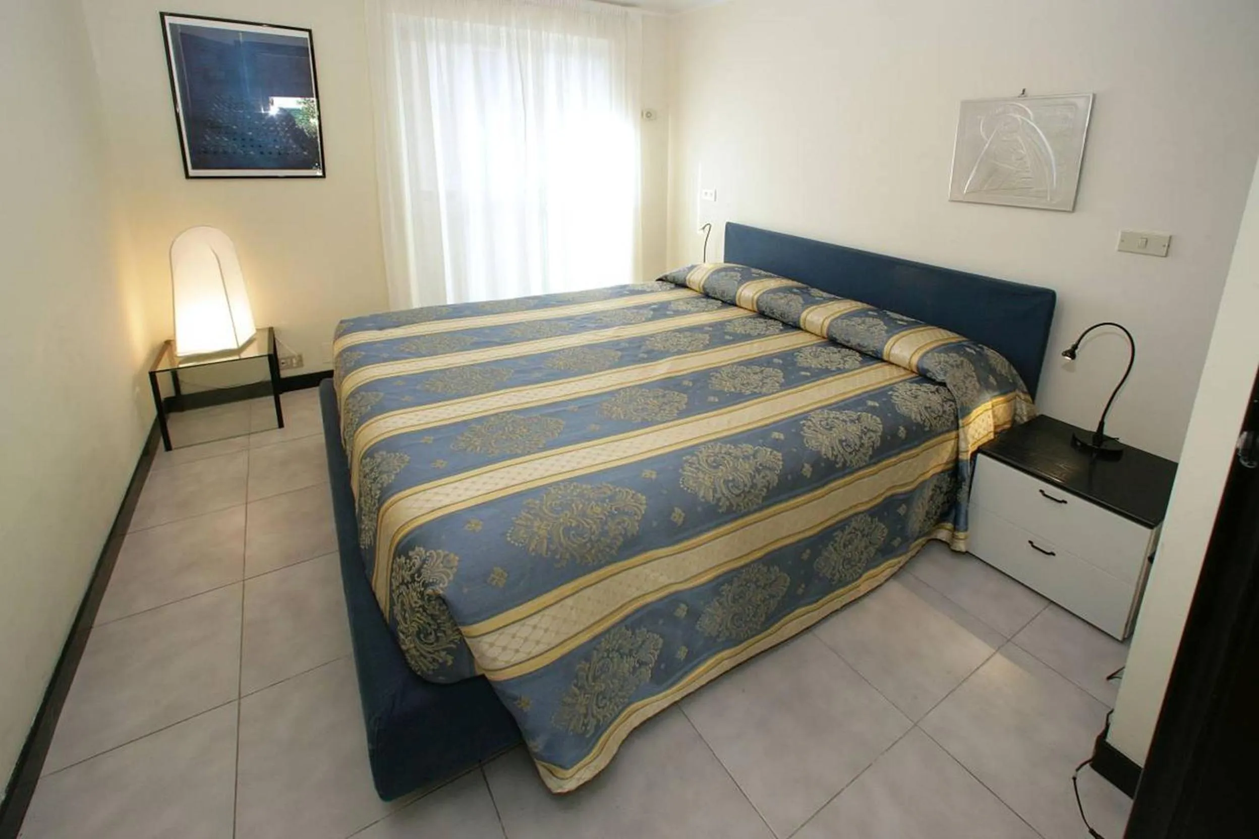 Bed in Savoia Apartments