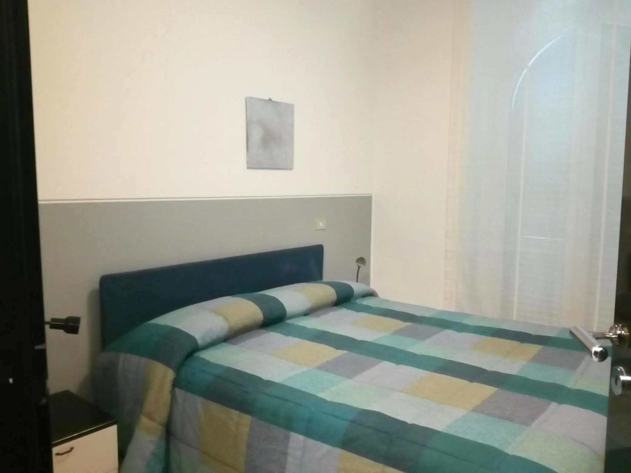 Bed in Savoia Apartments