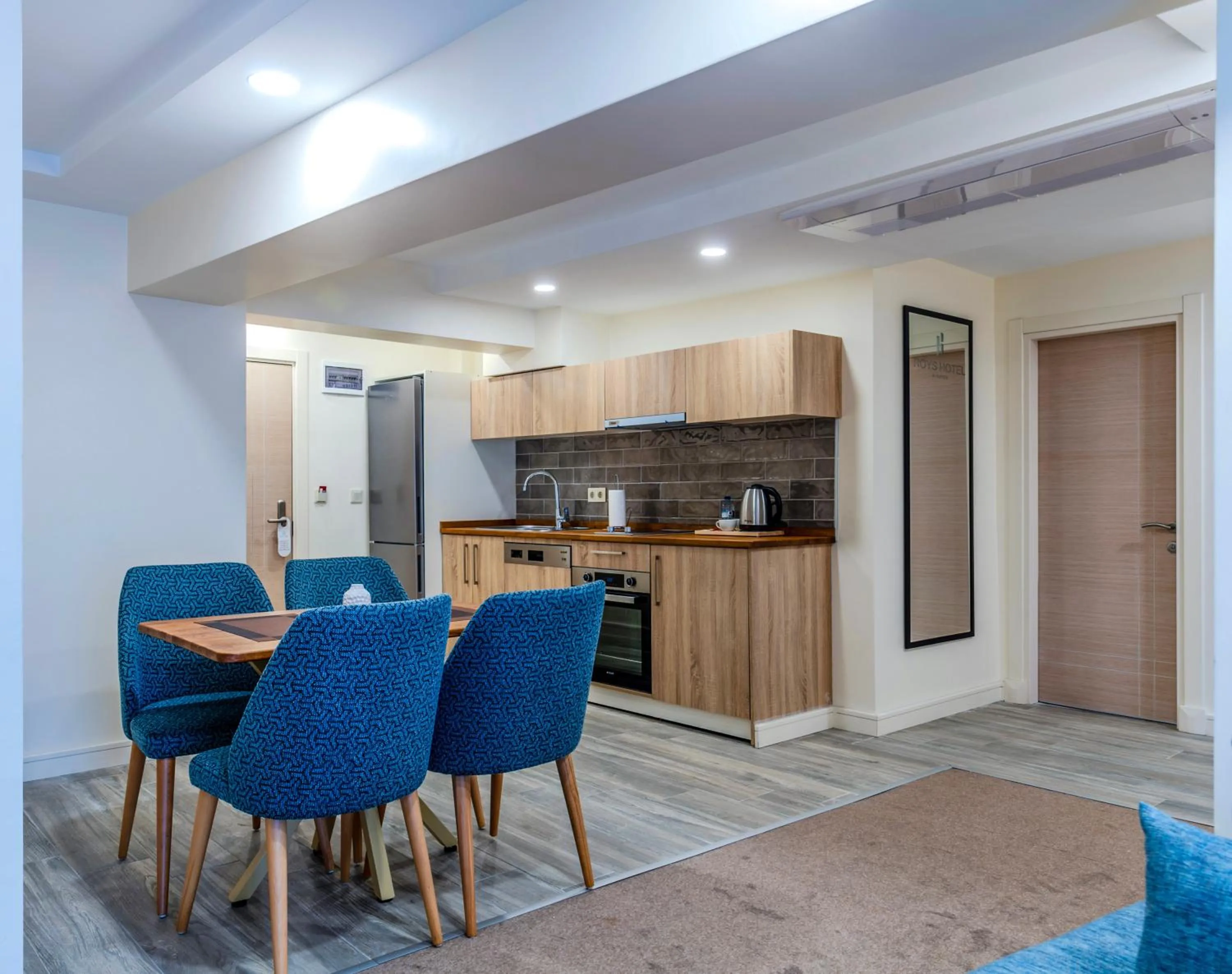 Kitchen or kitchenette in Roys Hotel & Suites