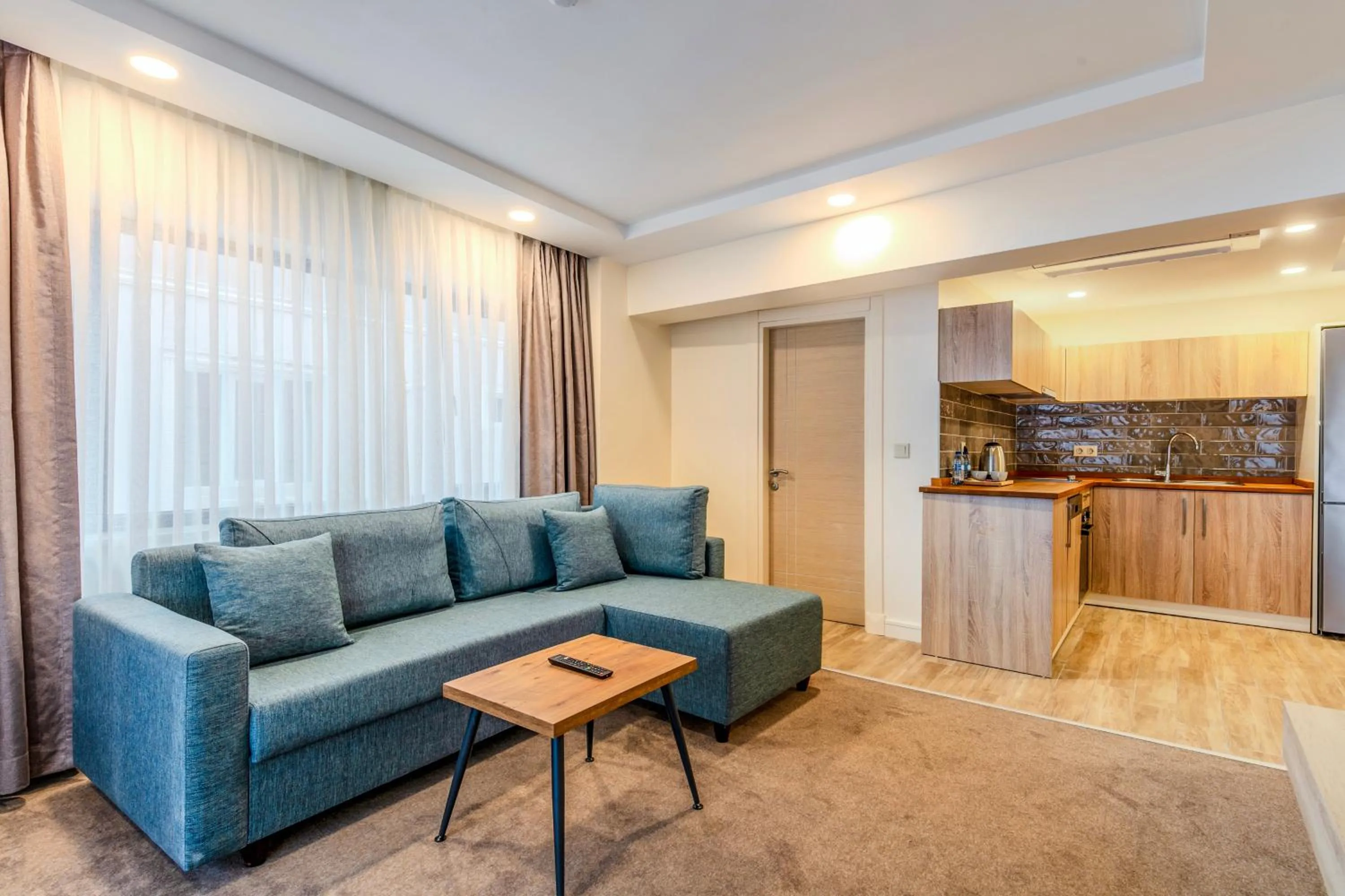 Kitchen or kitchenette in Roys Hotel & Suites