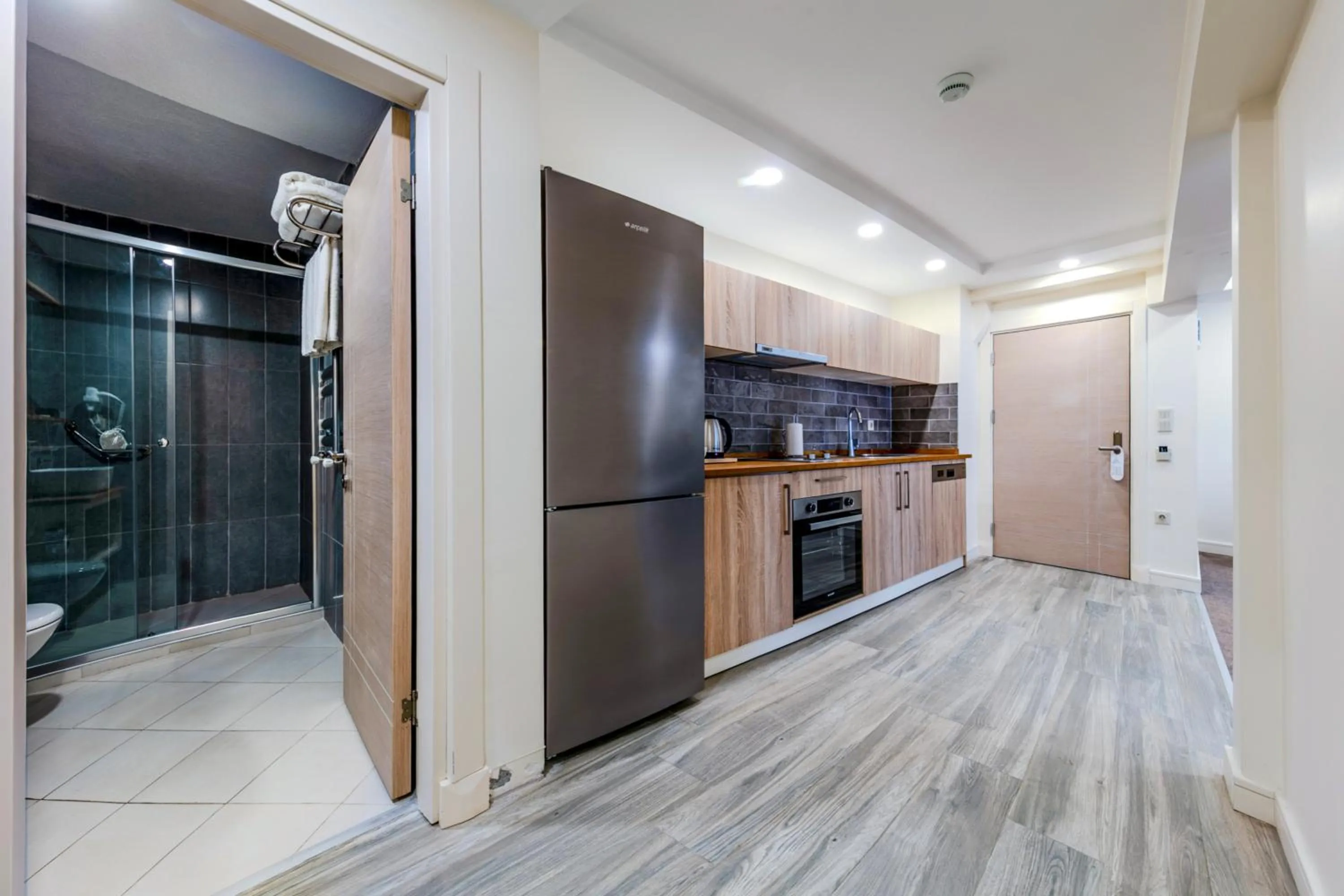 Kitchen or kitchenette in Roys Hotel & Suites