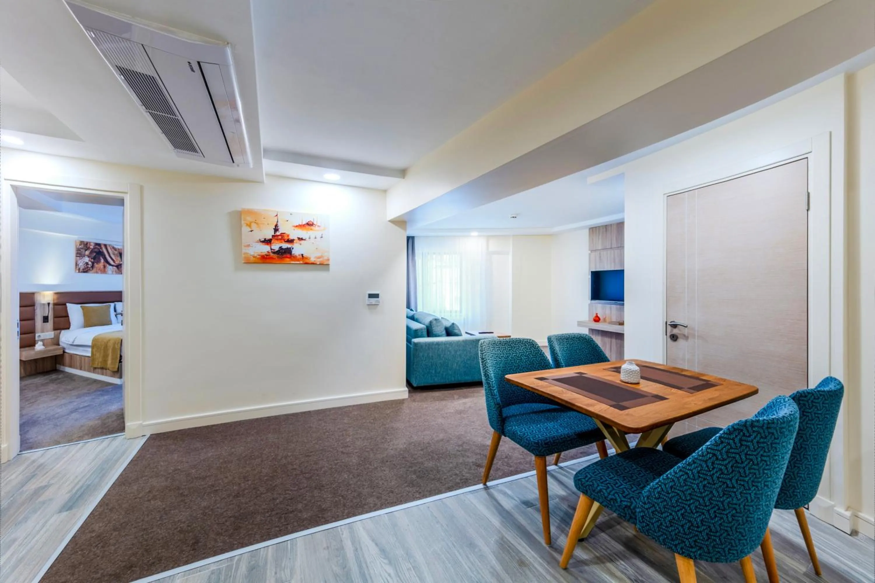 Bed in Roys Hotel & Suites