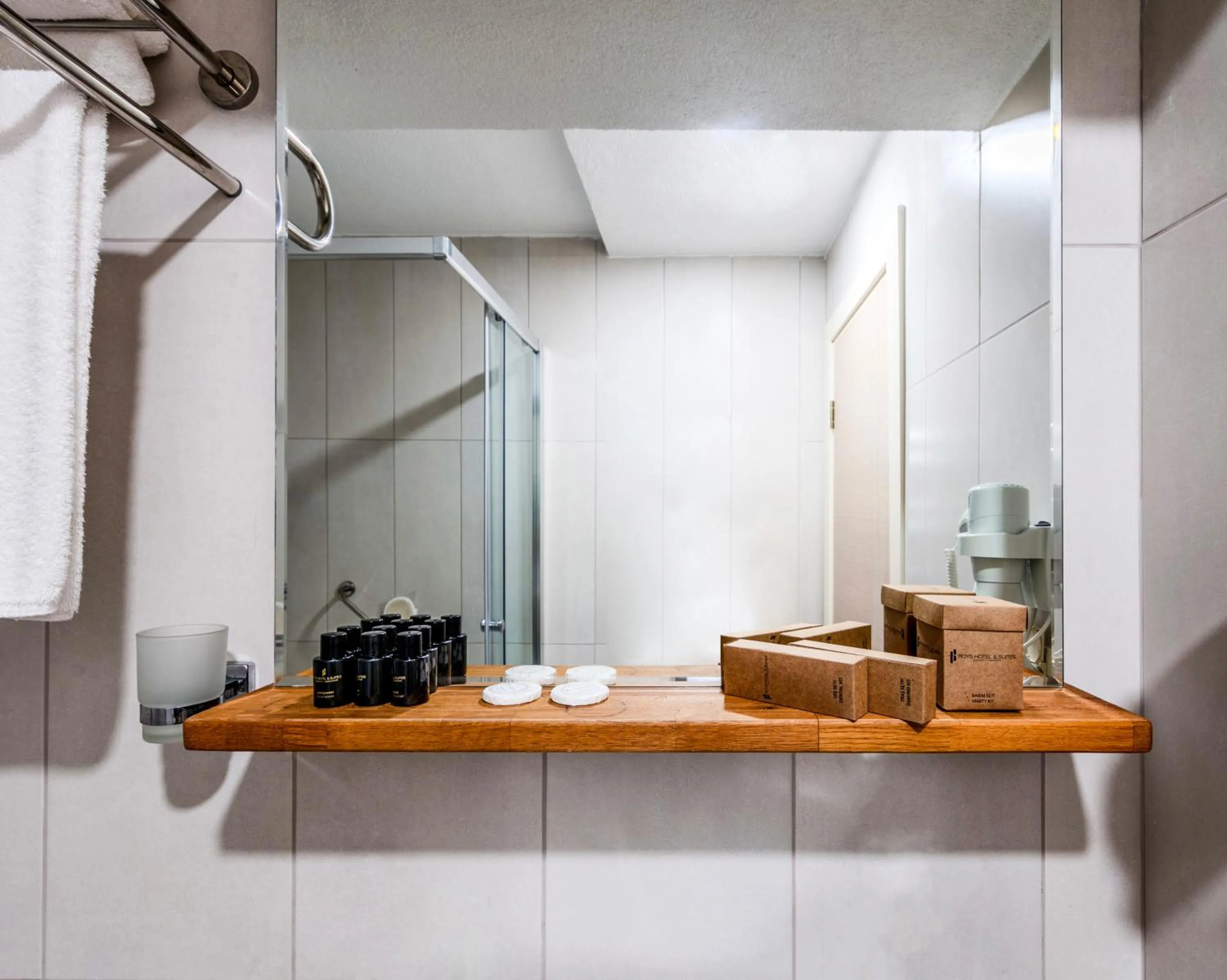 Bathroom in Roys Hotel & Suites