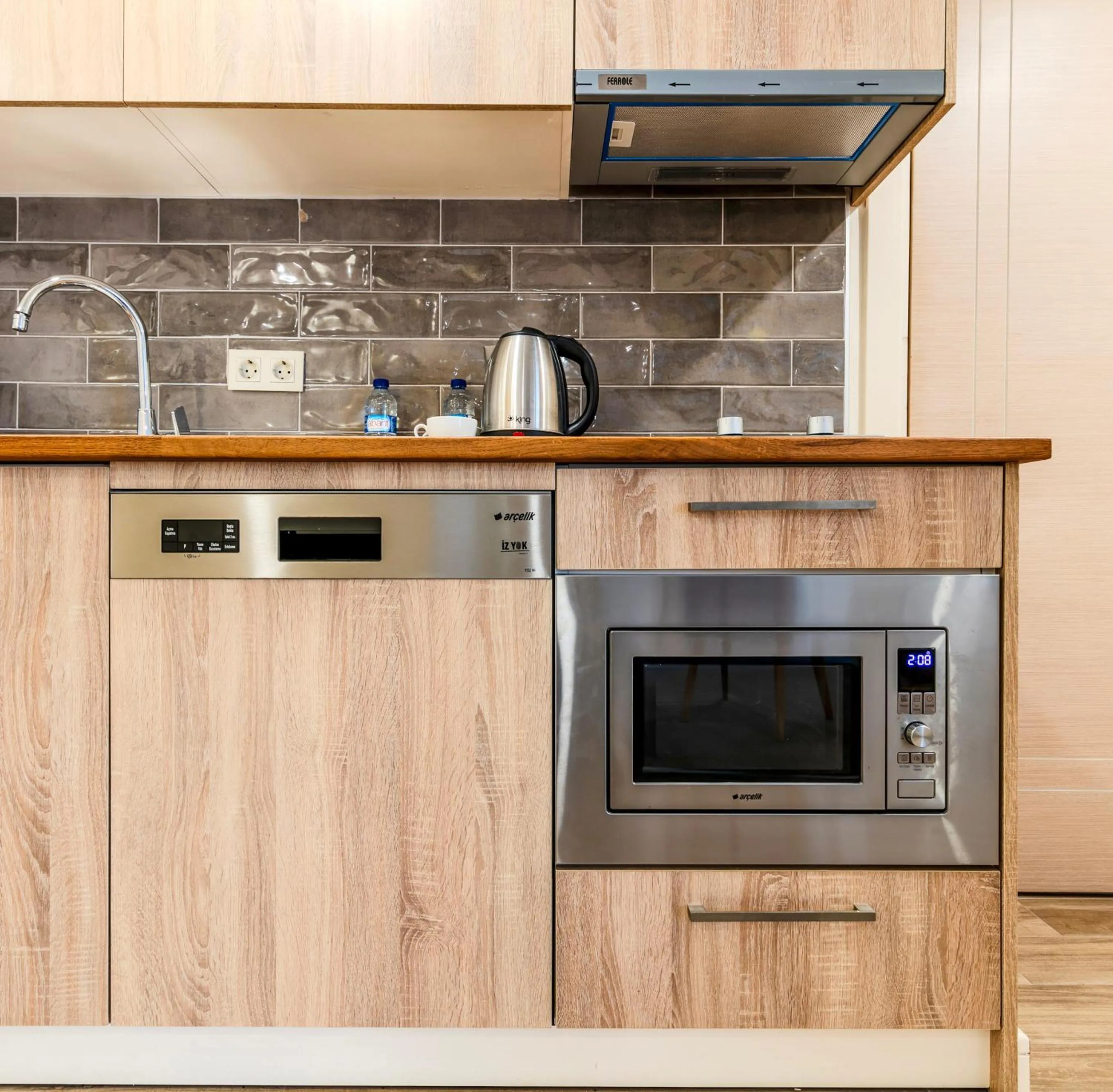 Kitchen or kitchenette in Roys Hotel & Suites