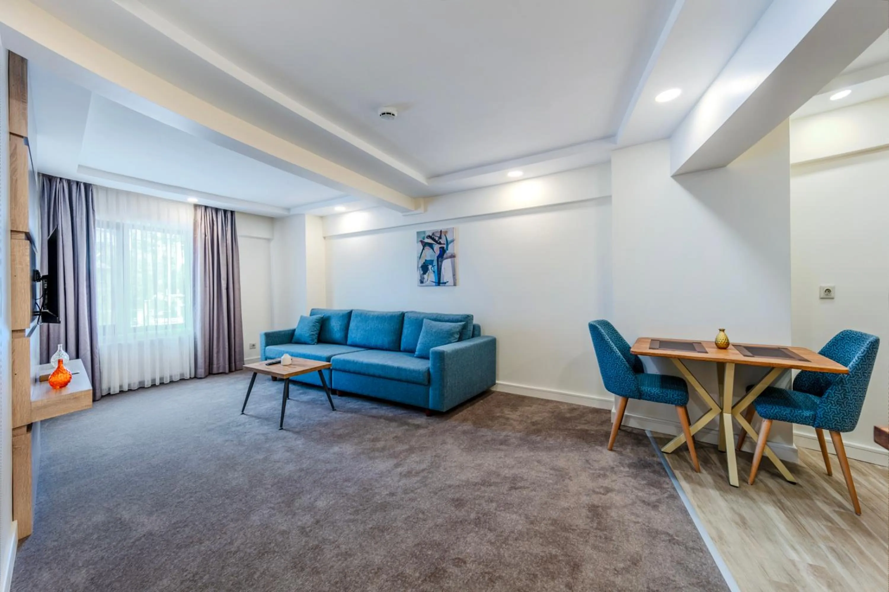 Living room in Roys Hotel & Suites