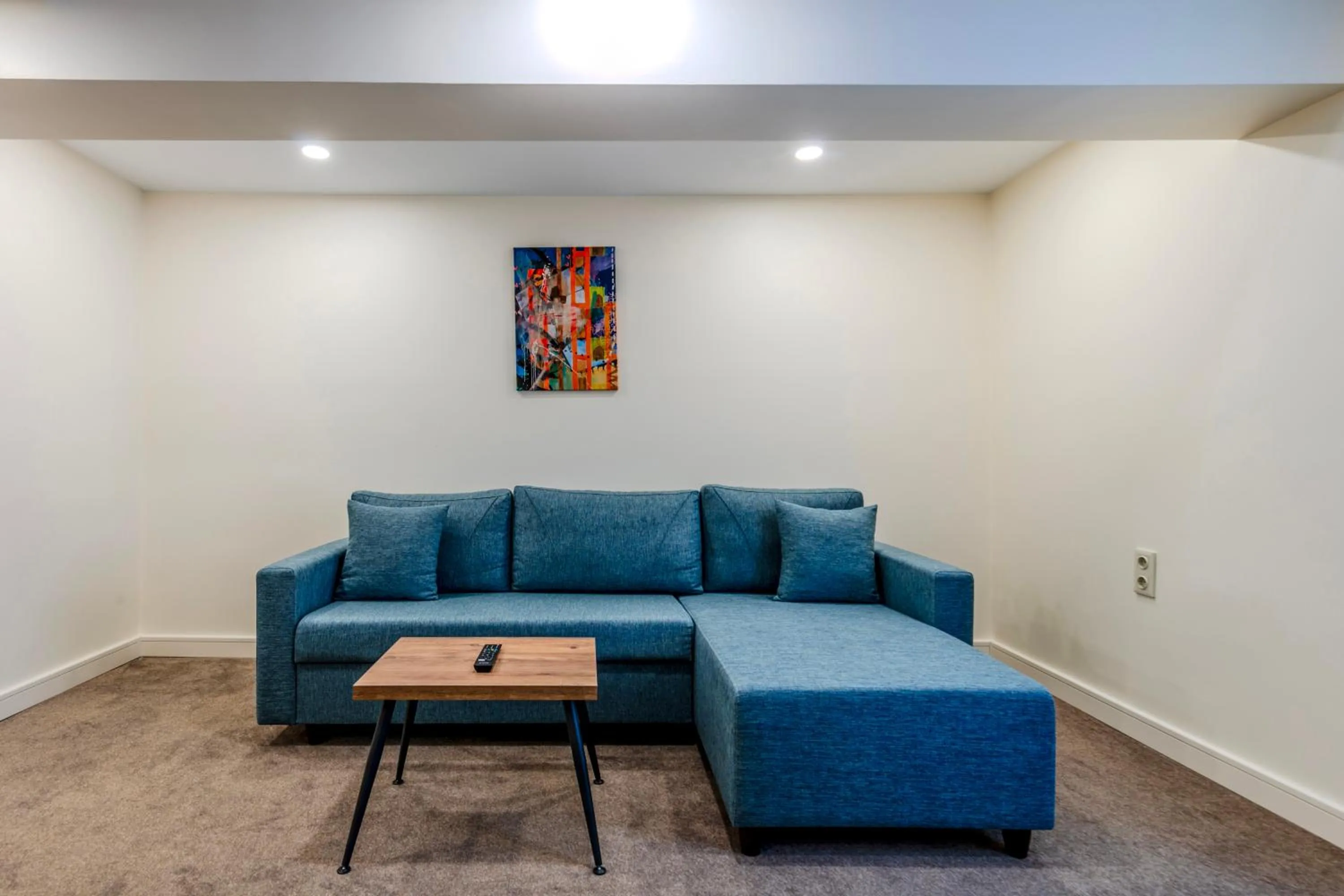 Living room in Roys Hotel & Suites