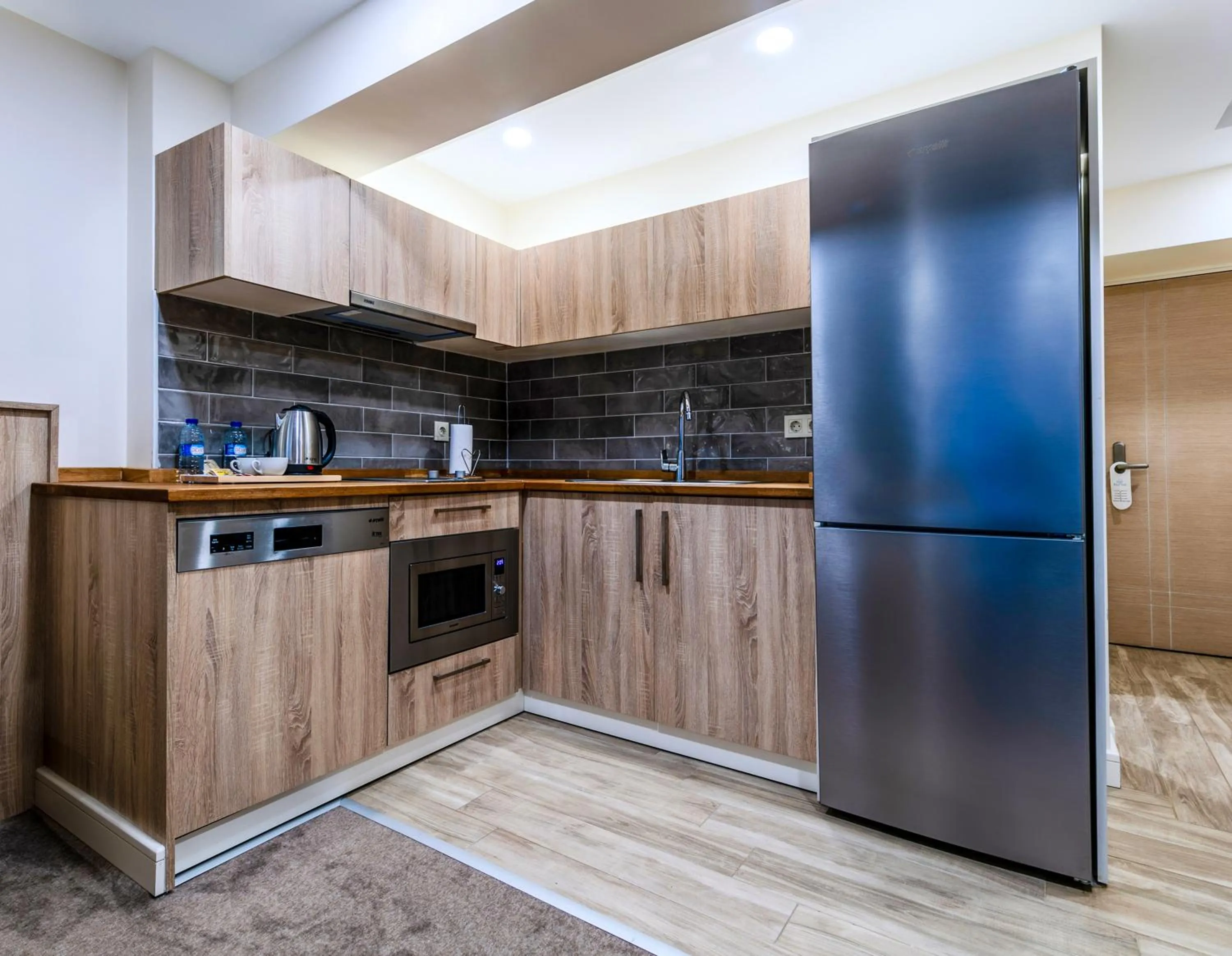 Kitchen or kitchenette in Roys Hotel & Suites