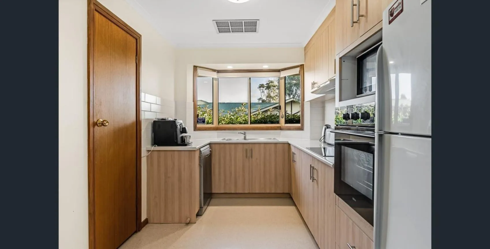 Kitchen or kitchenette in Apartments on Tolmie