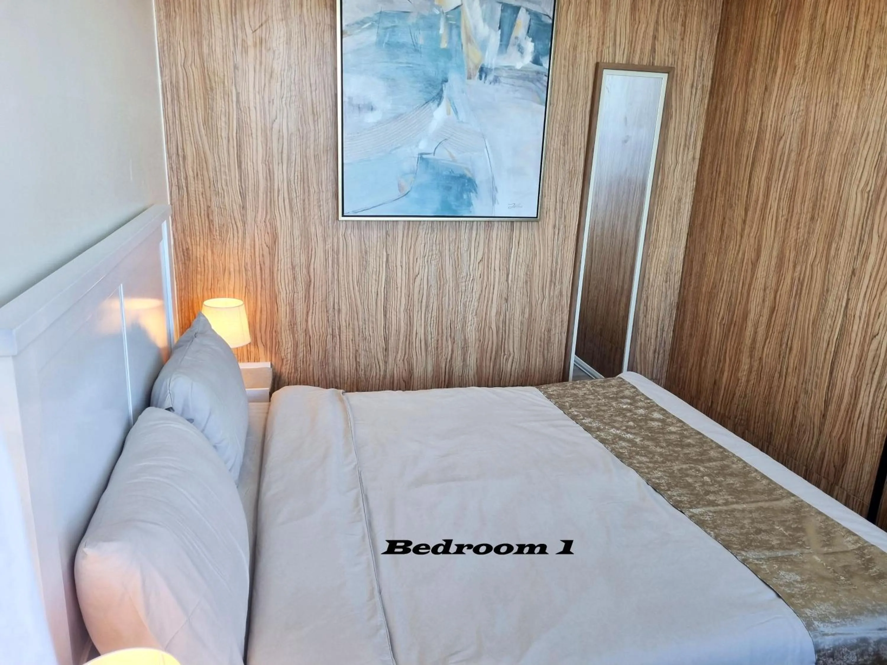 Living room, Bed in La Mirada Residences