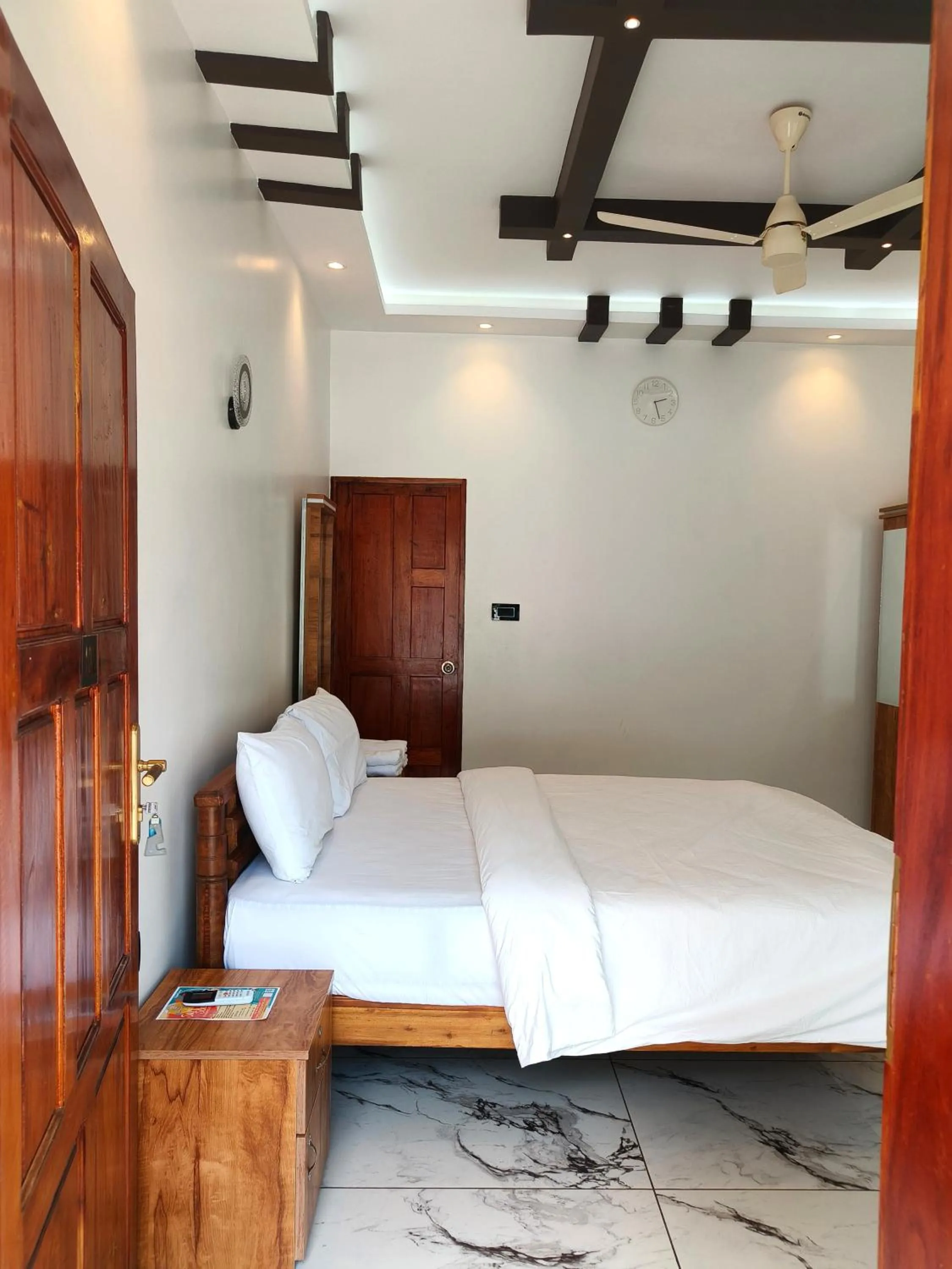 Bed in Wavealokam Beach Retreat