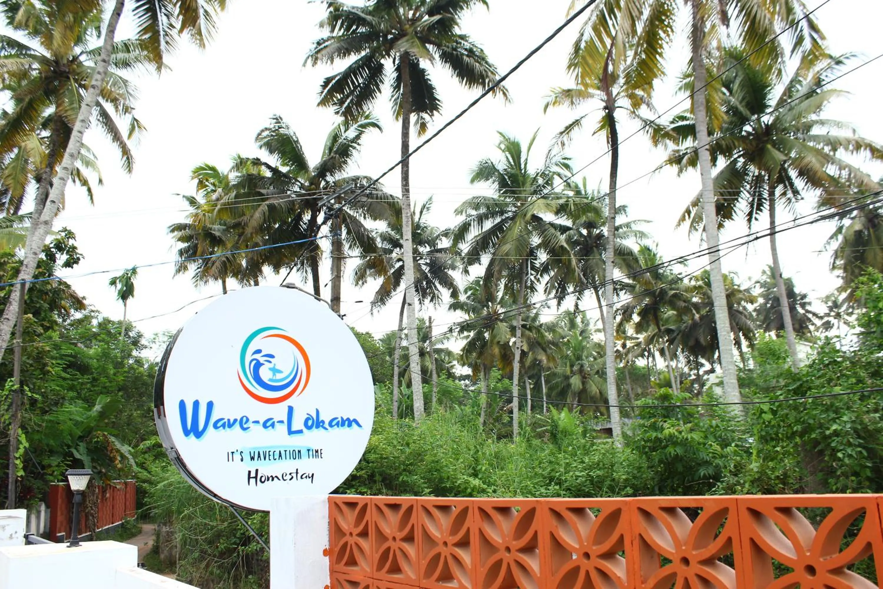 Property logo or sign in Wavealokam Beach Retreat
